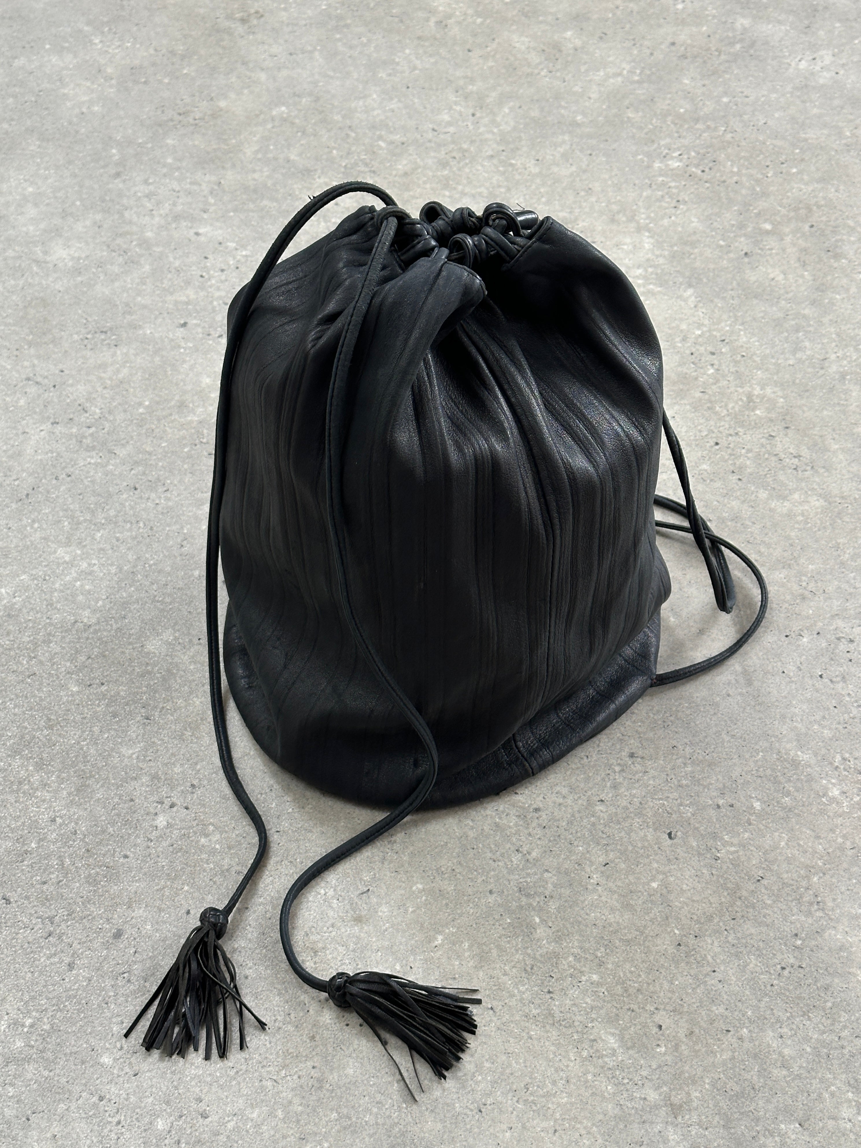 Giorgio Armani Le Collezioni leather rucksack bag with adjustable straps and sleek design, perfect for stylish everyday use.