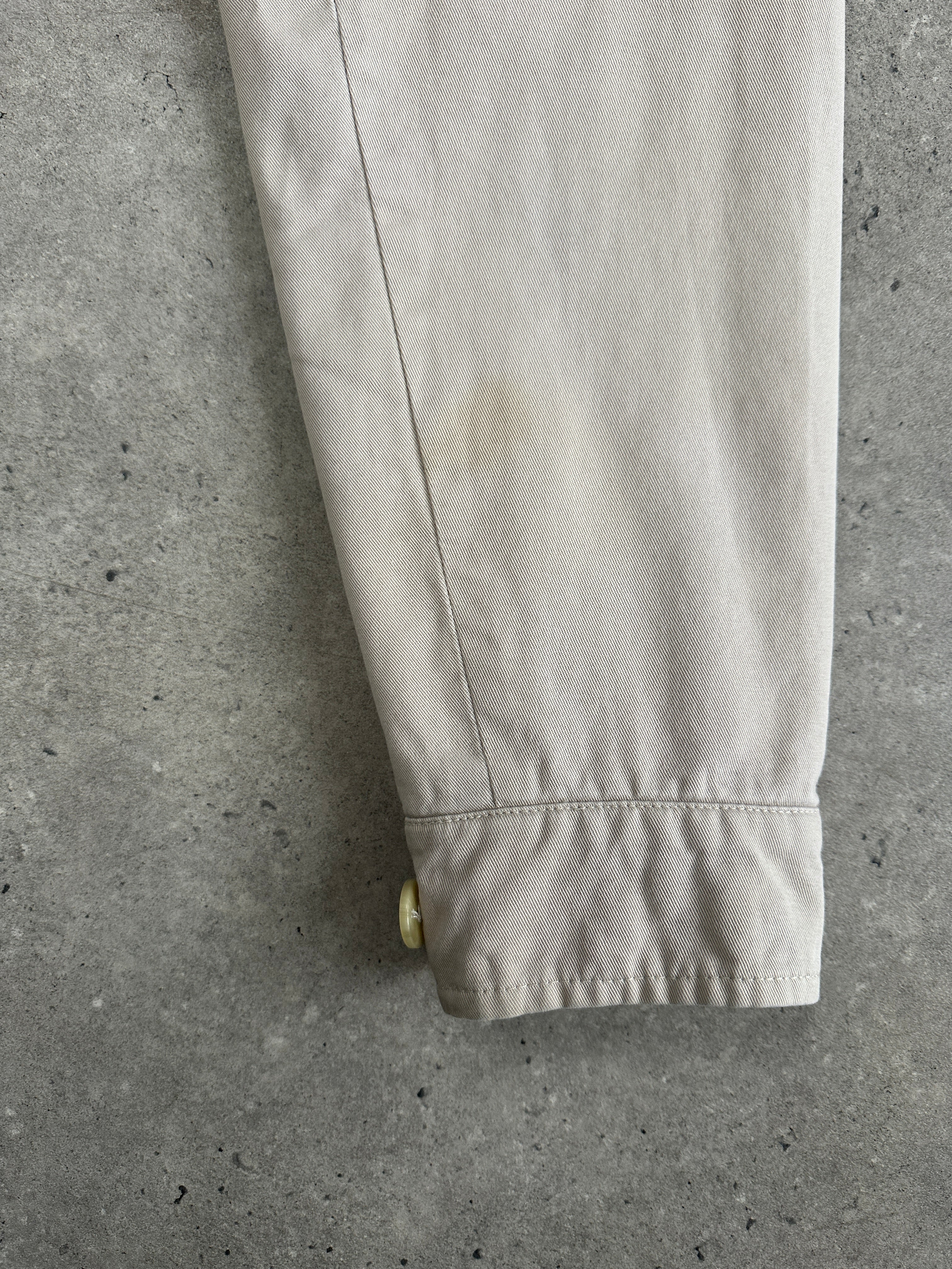 Thomas Burberry 1990s cotton Harrington bomber jacket in XL, featuring classic design and durable fabric, styled with a zipper front.