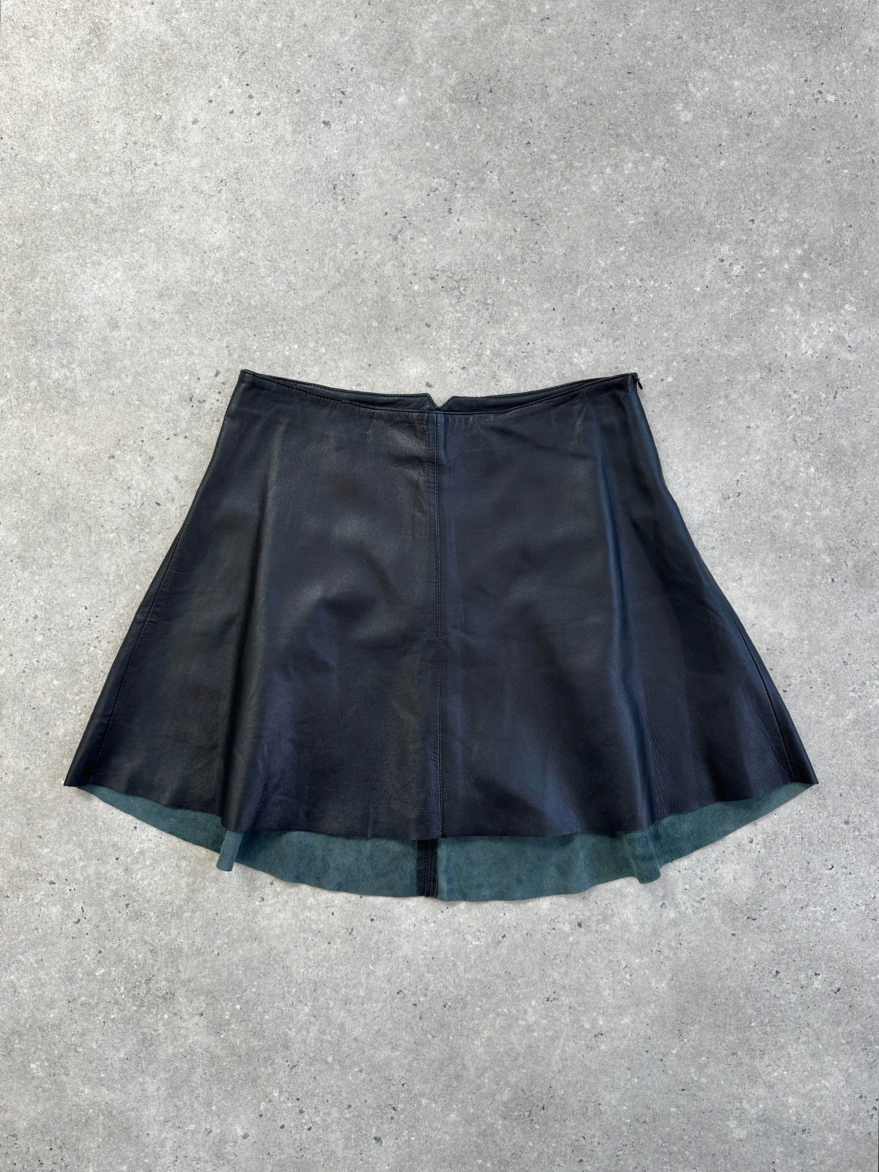 Pinko Italian leather A-line skirt in blush pink, high-waisted design with smooth finish and elegant silhouette.