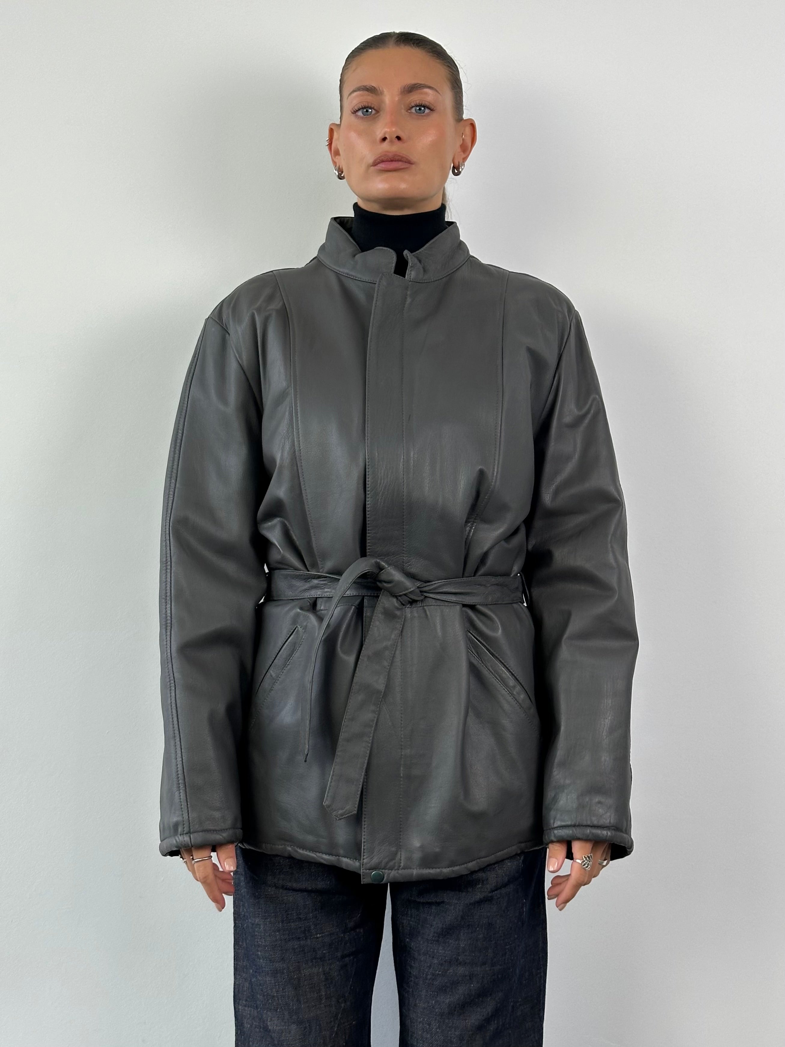 Italian vintage leather belted jacket in XL, featuring classic design and durable leather construction.