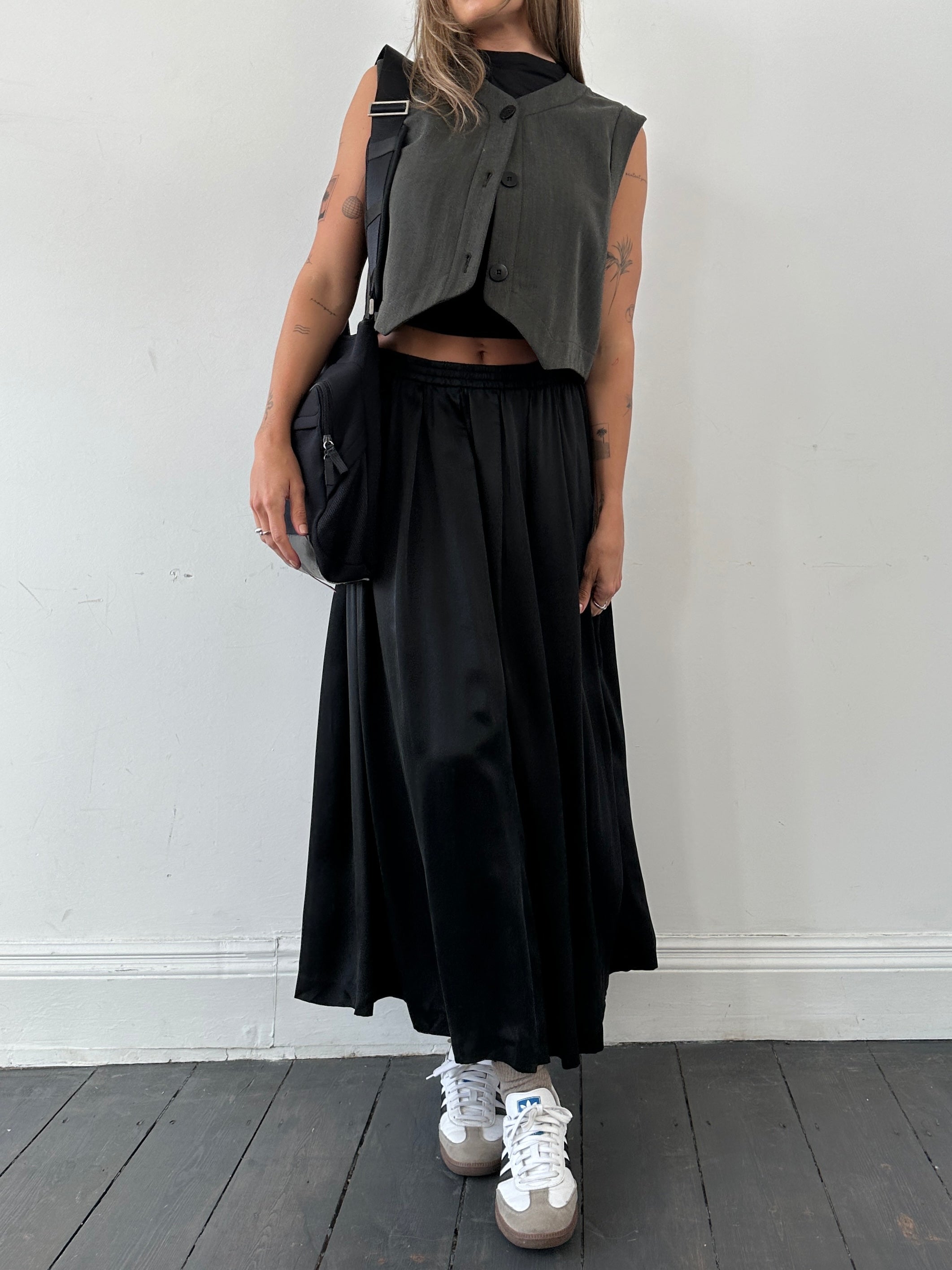 Jaeger pure silk elasticated pleated maxi skirt in W28, showcasing flowing fabric and elegant pleats.