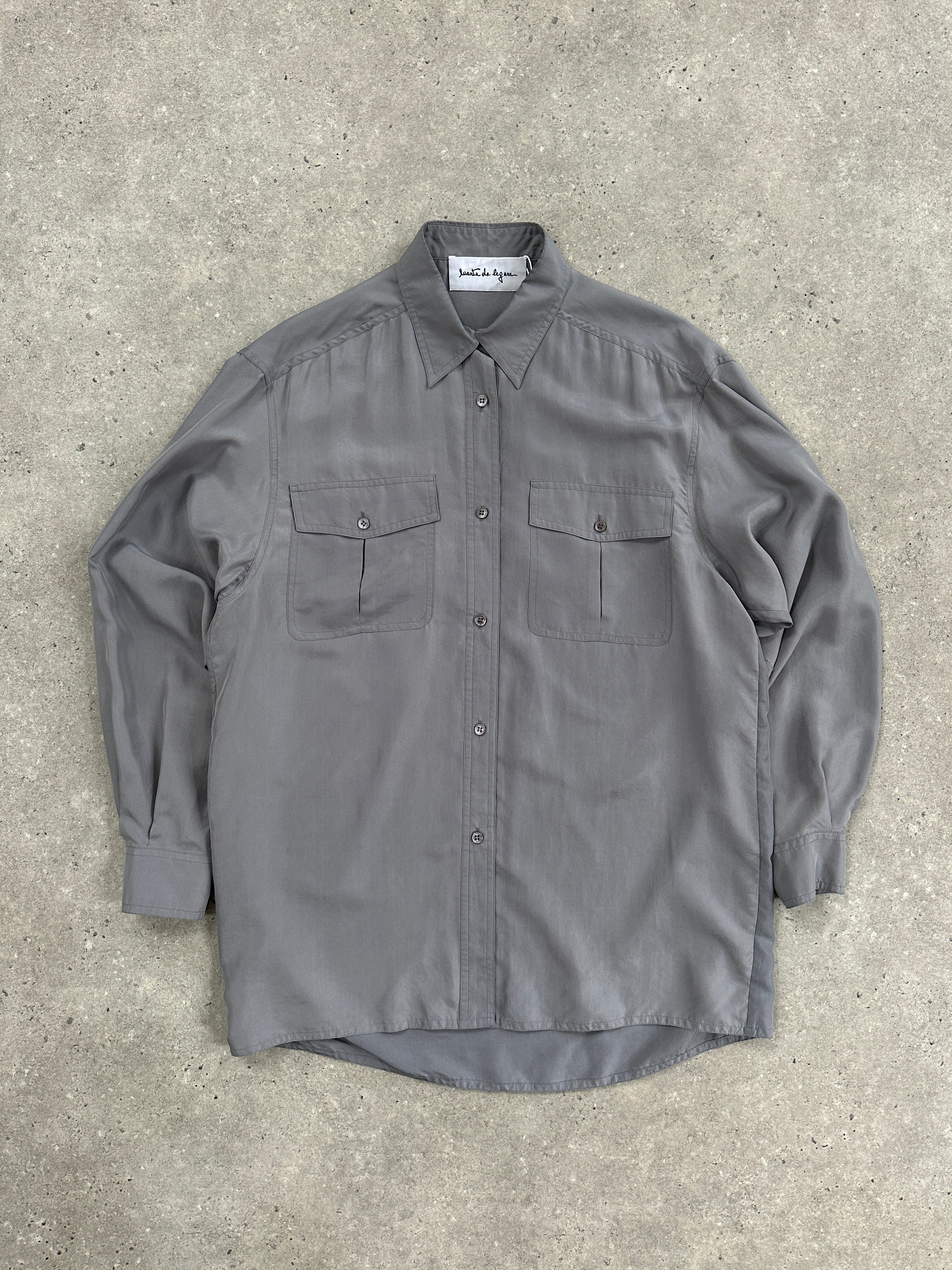 Vintage 1990s relaxed pure silk shirt in size L, featuring a classic style with smooth fabric and vintage design details.