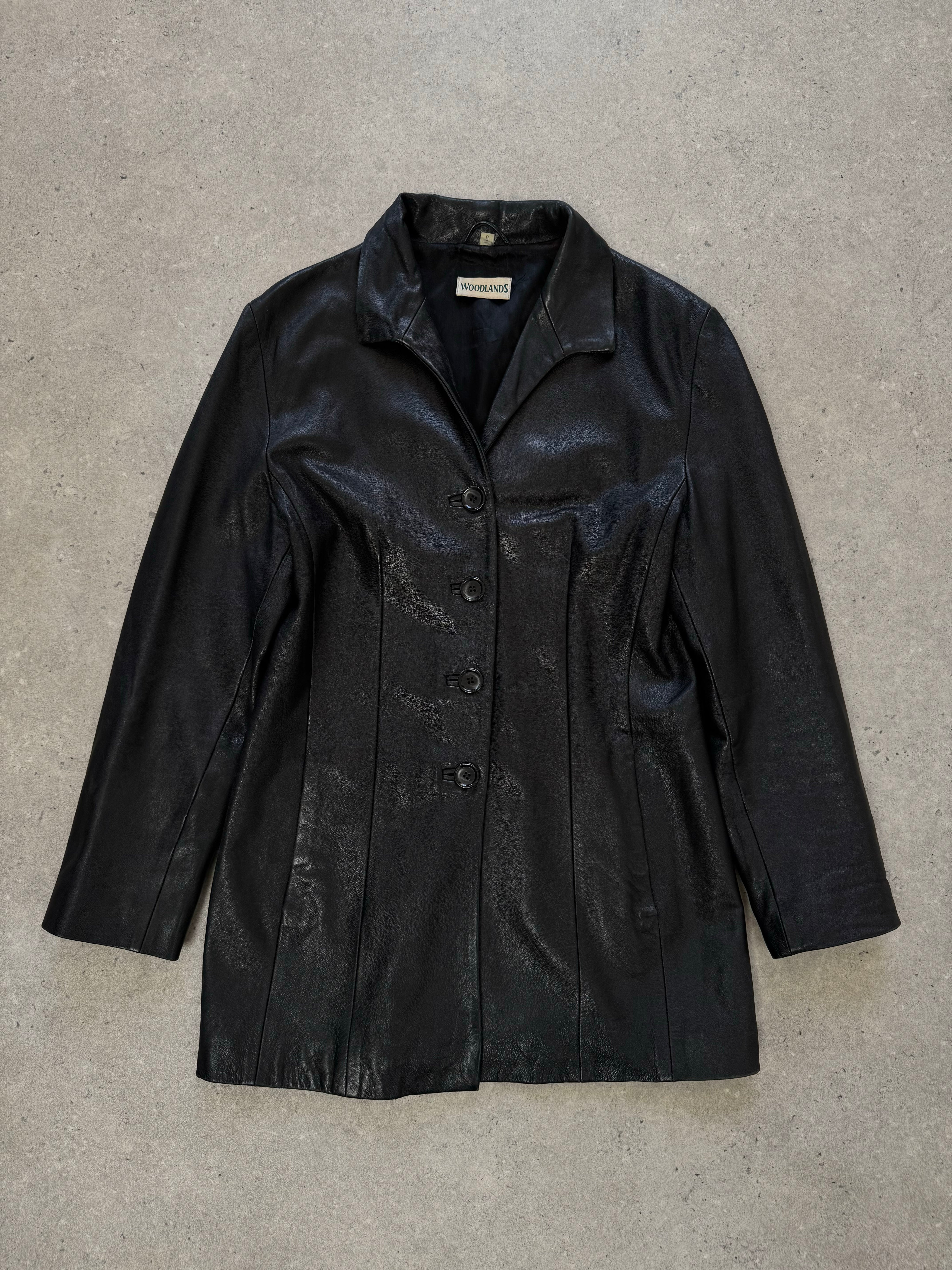 Vintage British 1990s fitted leather jacket for women, showcasing classic design and high-quality leather detail.
