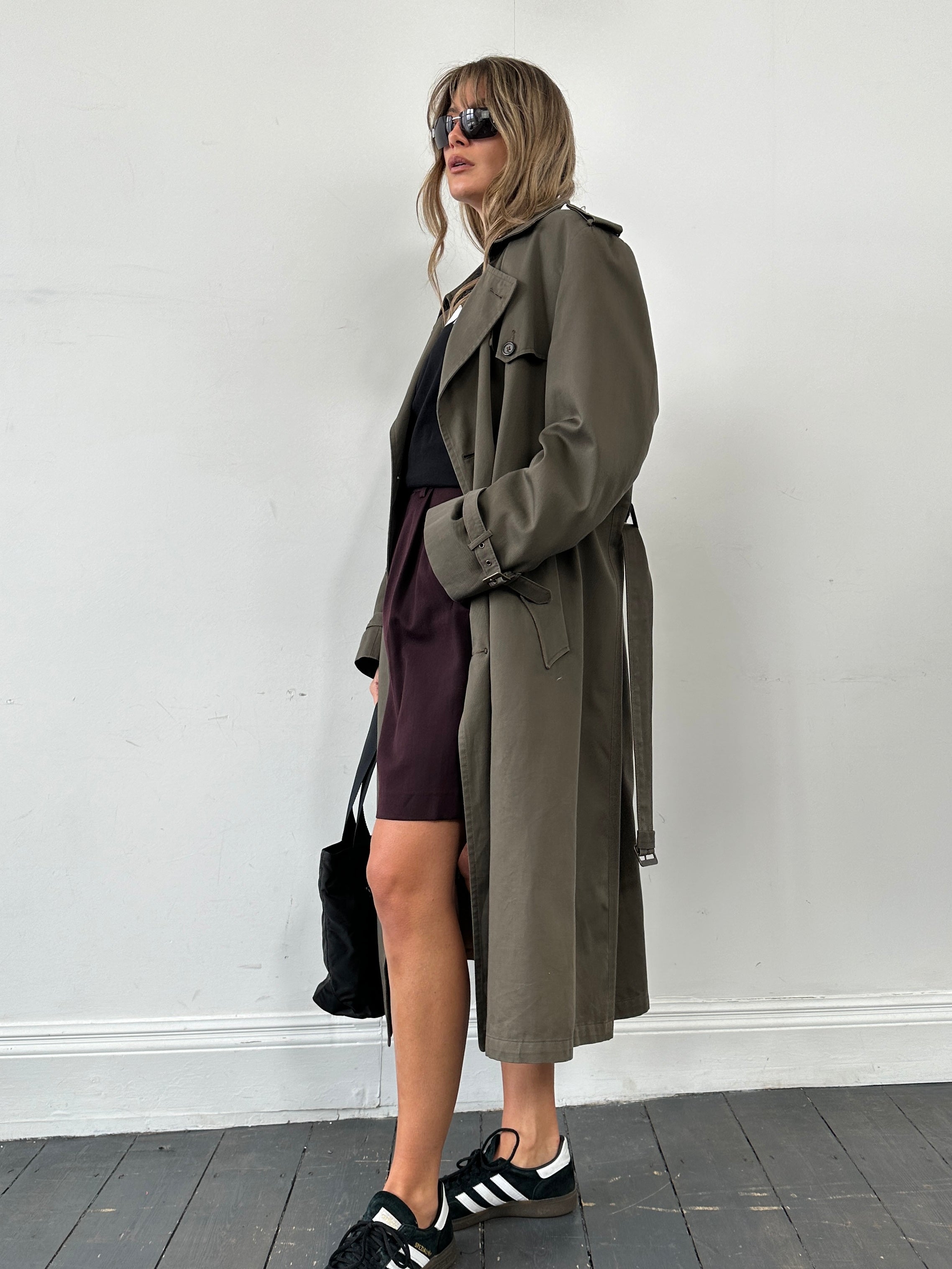 Christian Dior Monsieur cotton double-breasted belted trench coat in XL, shown hanging with classic beige color and tailored fit.