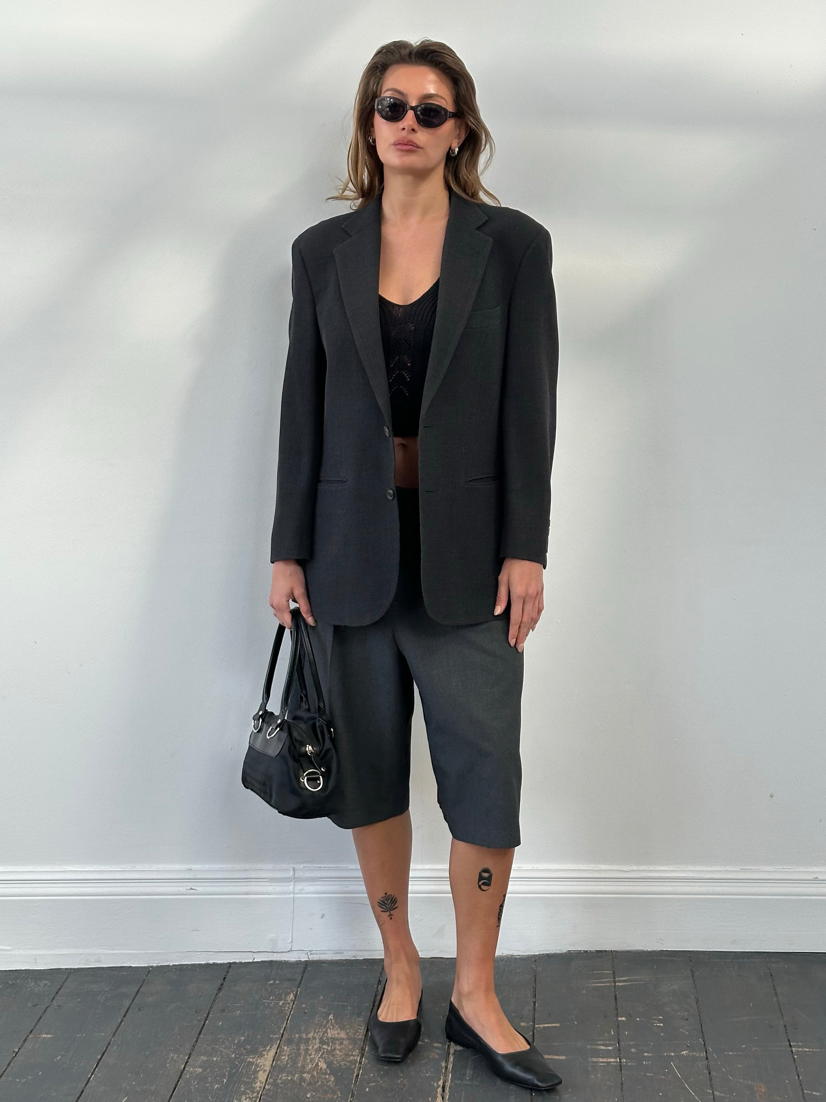 Burberry London 2000s wool single-breasted woven blazer in size M, featuring classic tailored fit and signature check pattern.