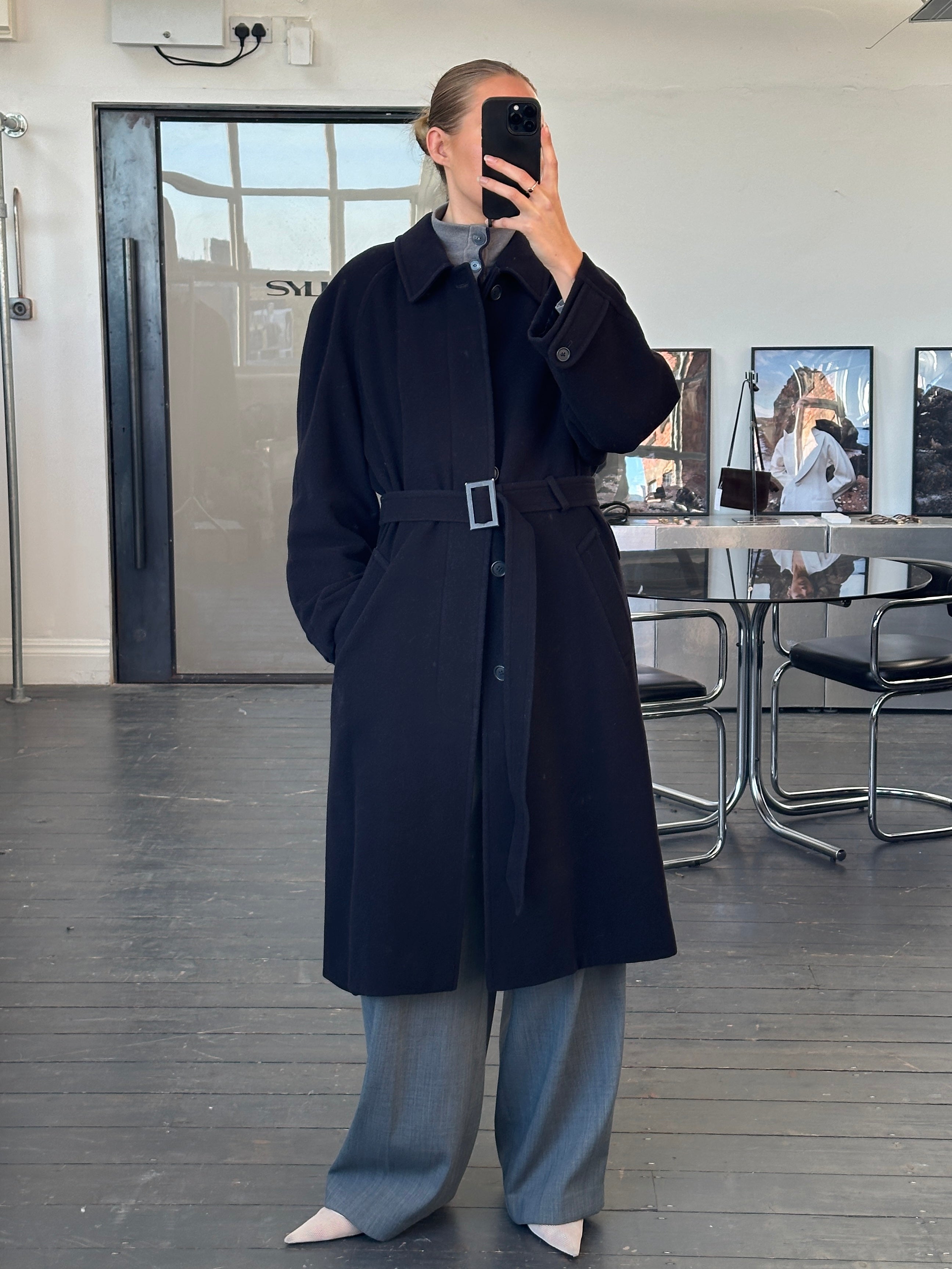 Vintage 1990s wool cashmere belted coat in size L/XL, featuring classic style and warm, textured fabric.