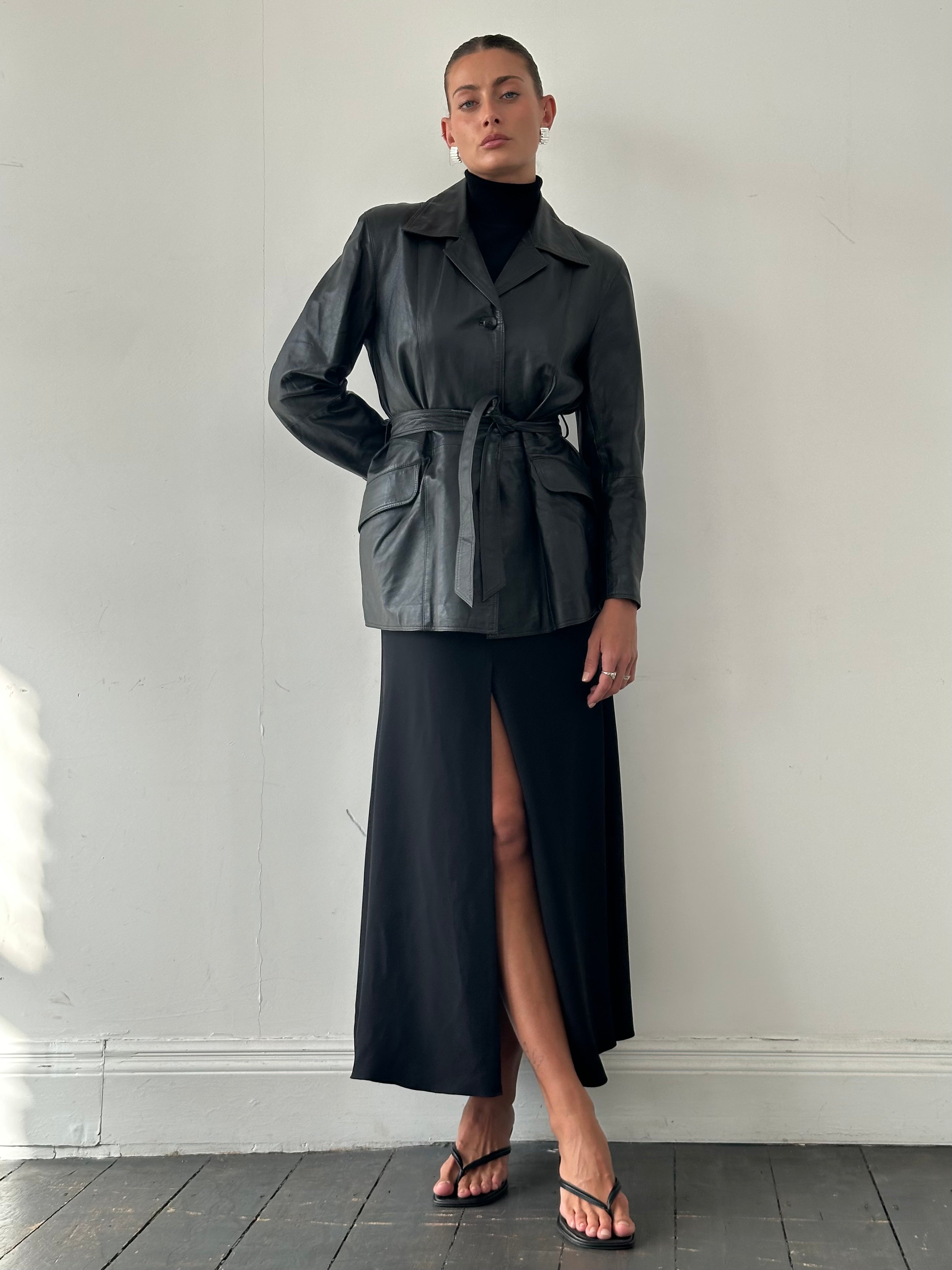 Conbipel leather belted jacket in size M, stylish brown jacket with front belt and classic design, visible zipper details.