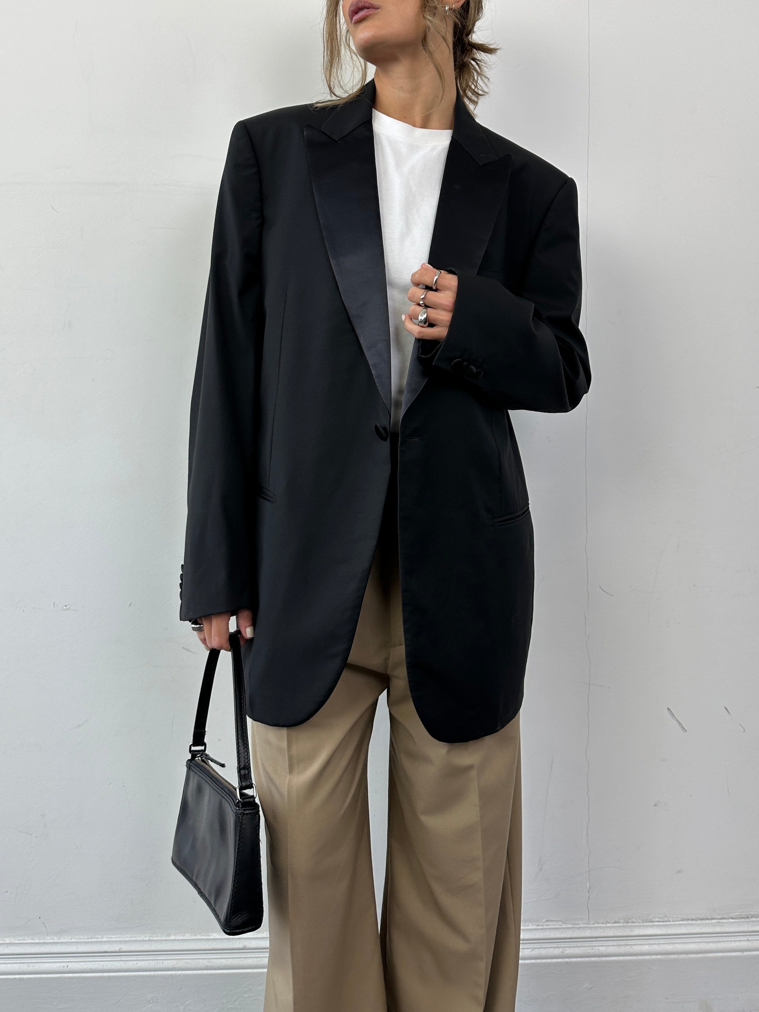 Givenchy pure wool single-breasted tuxedo blazer in size XL, tailored fit with notch lapels and sleek black fabric.