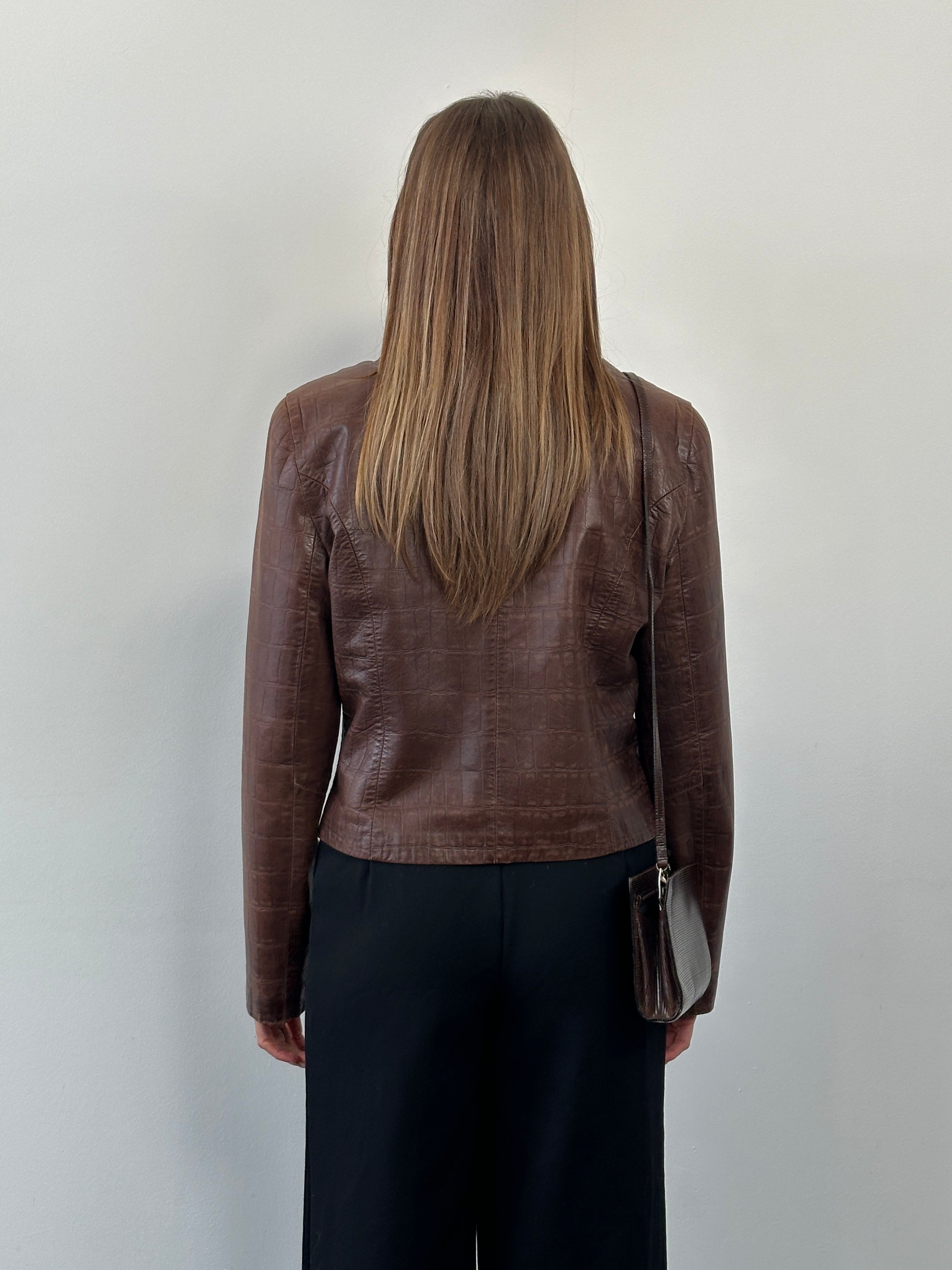 Emporio Armani 1990s leather jacket in size S/M, black with classic design, visible leather texture and stylish collar.