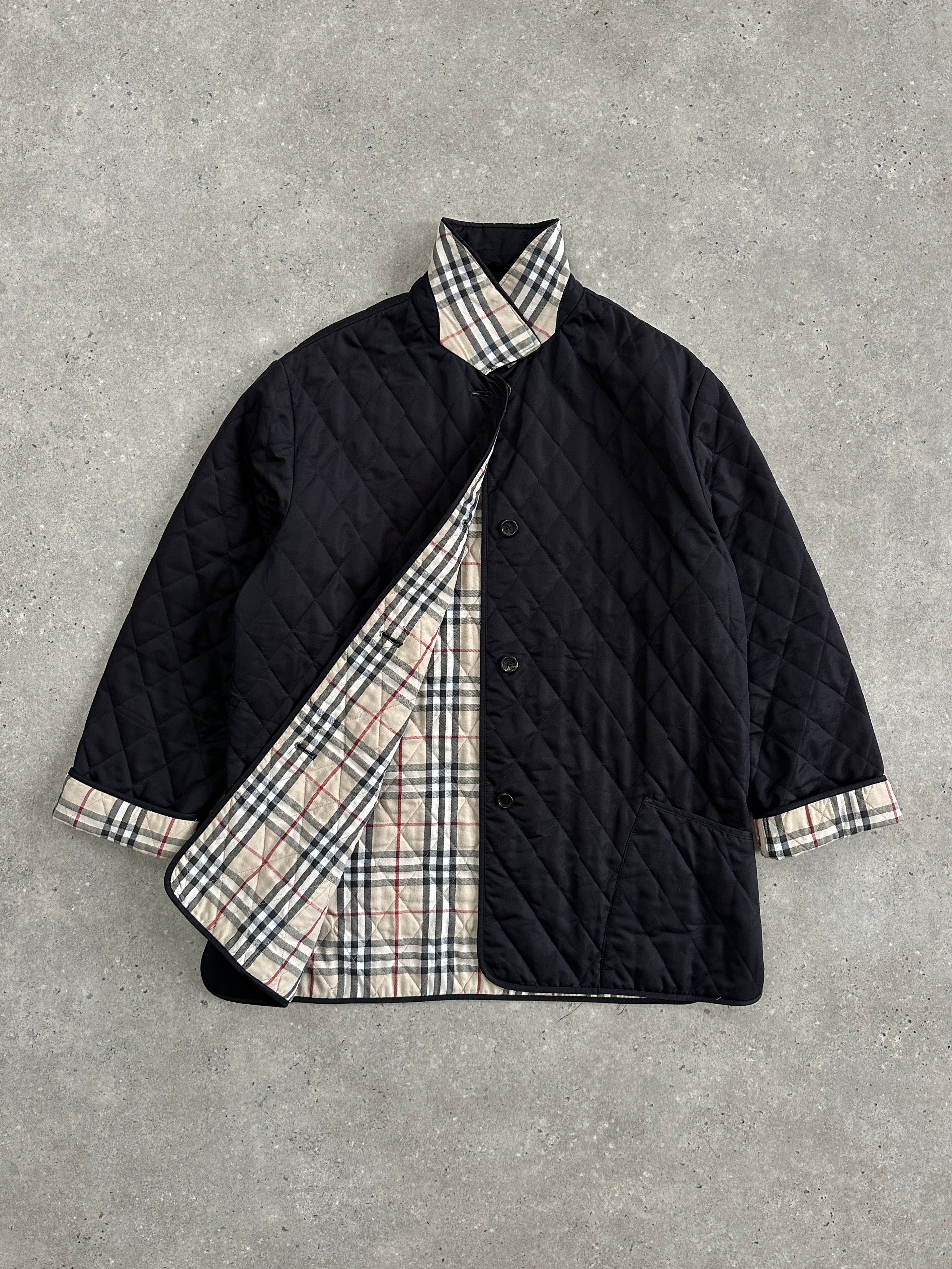 Burberry London 2000s quilted nylon single-breasted coat in size L, featuring a classic design and Burberry branding.