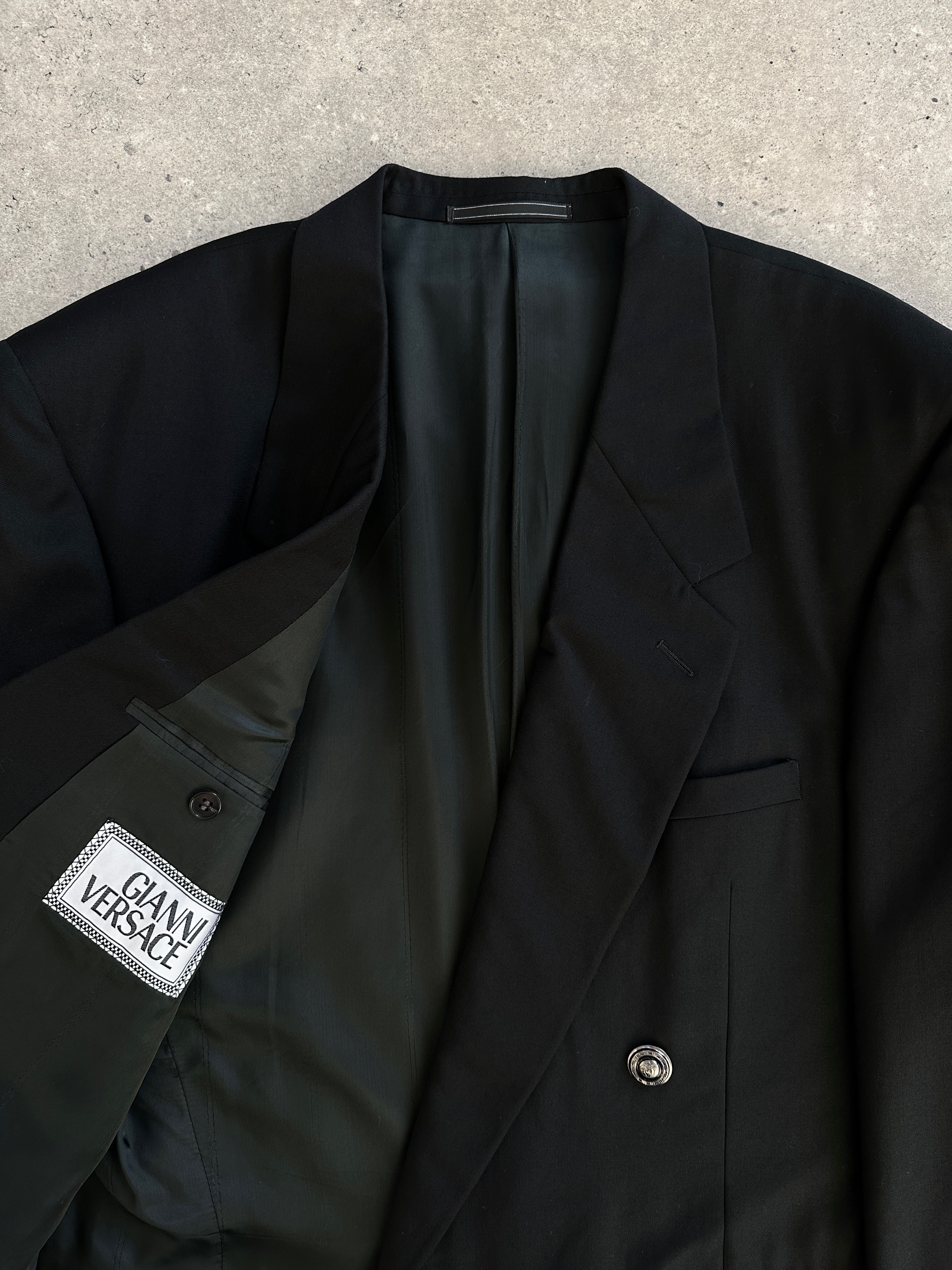 Gianni Versace 1990s bespoke Medusa button double-breasted blazer in size 40R/L, featuring classic design and bold Medusa details.