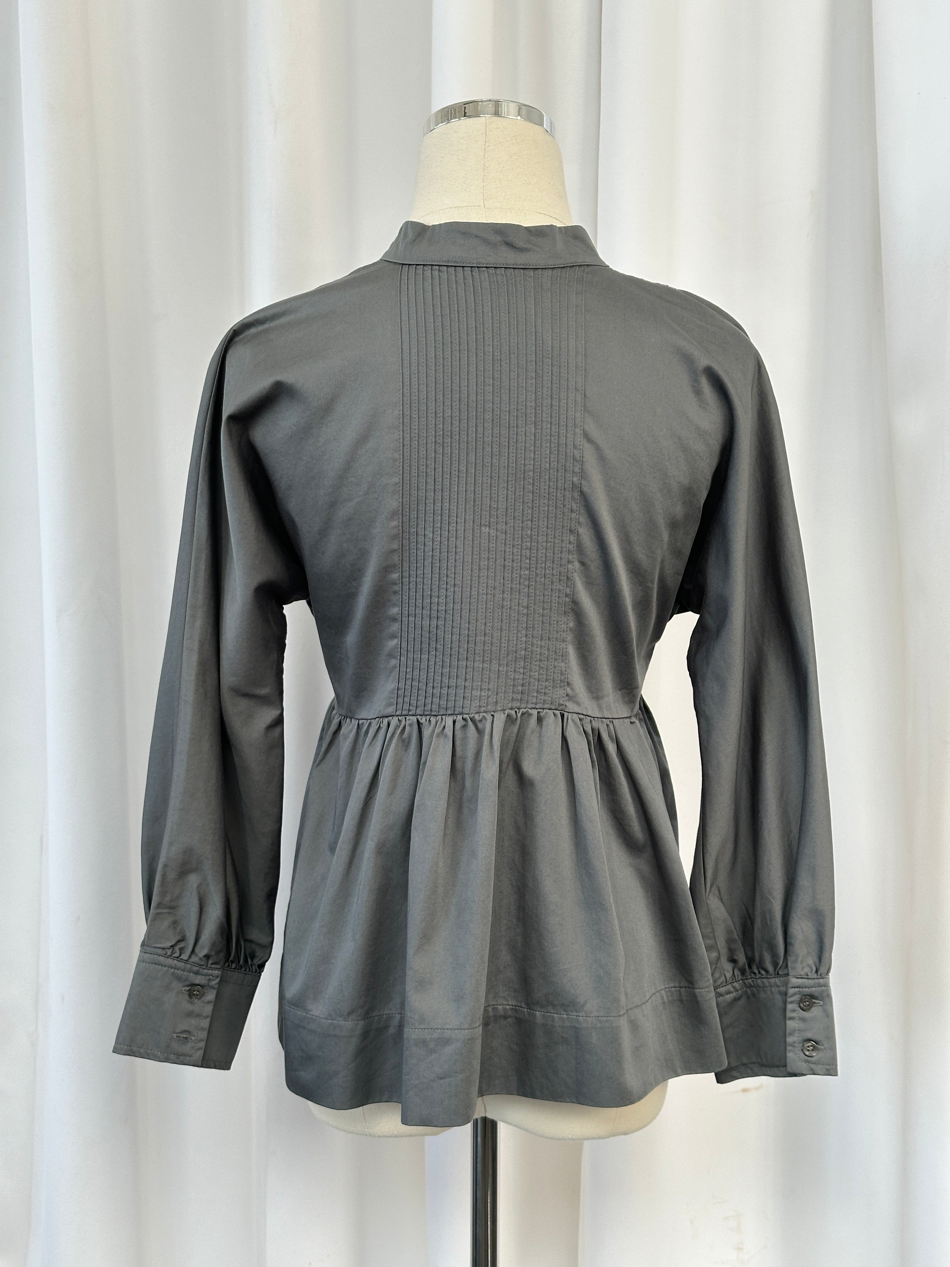 Vintage 2000s peplum cotton tie shirt in XS/S, featuring a classic retro style with a fitted silhouette and button front.