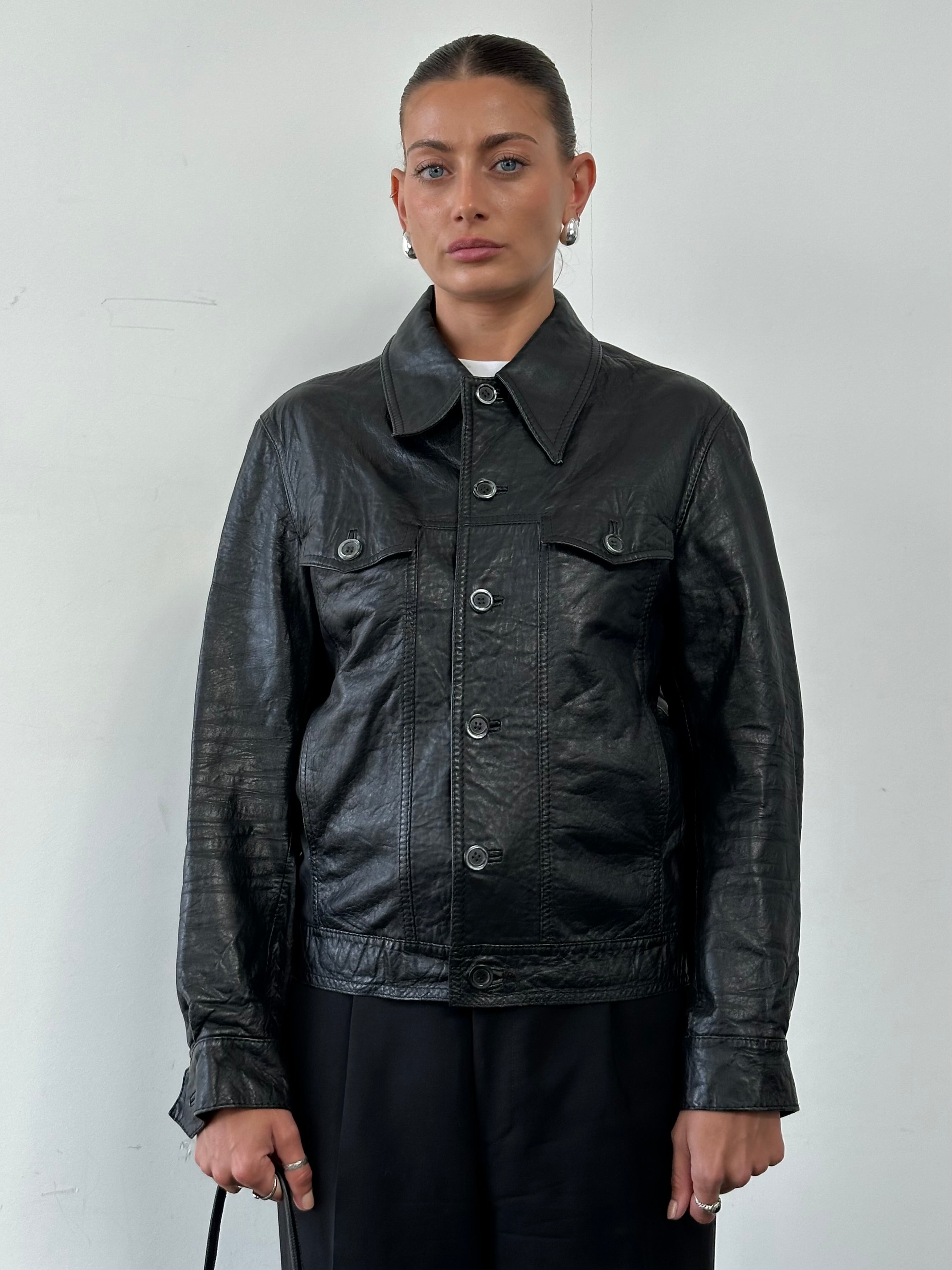 Vintage leather jacket with dagger collar, slim fit style, in size small, featuring classic distressed leather from Vintage brand.