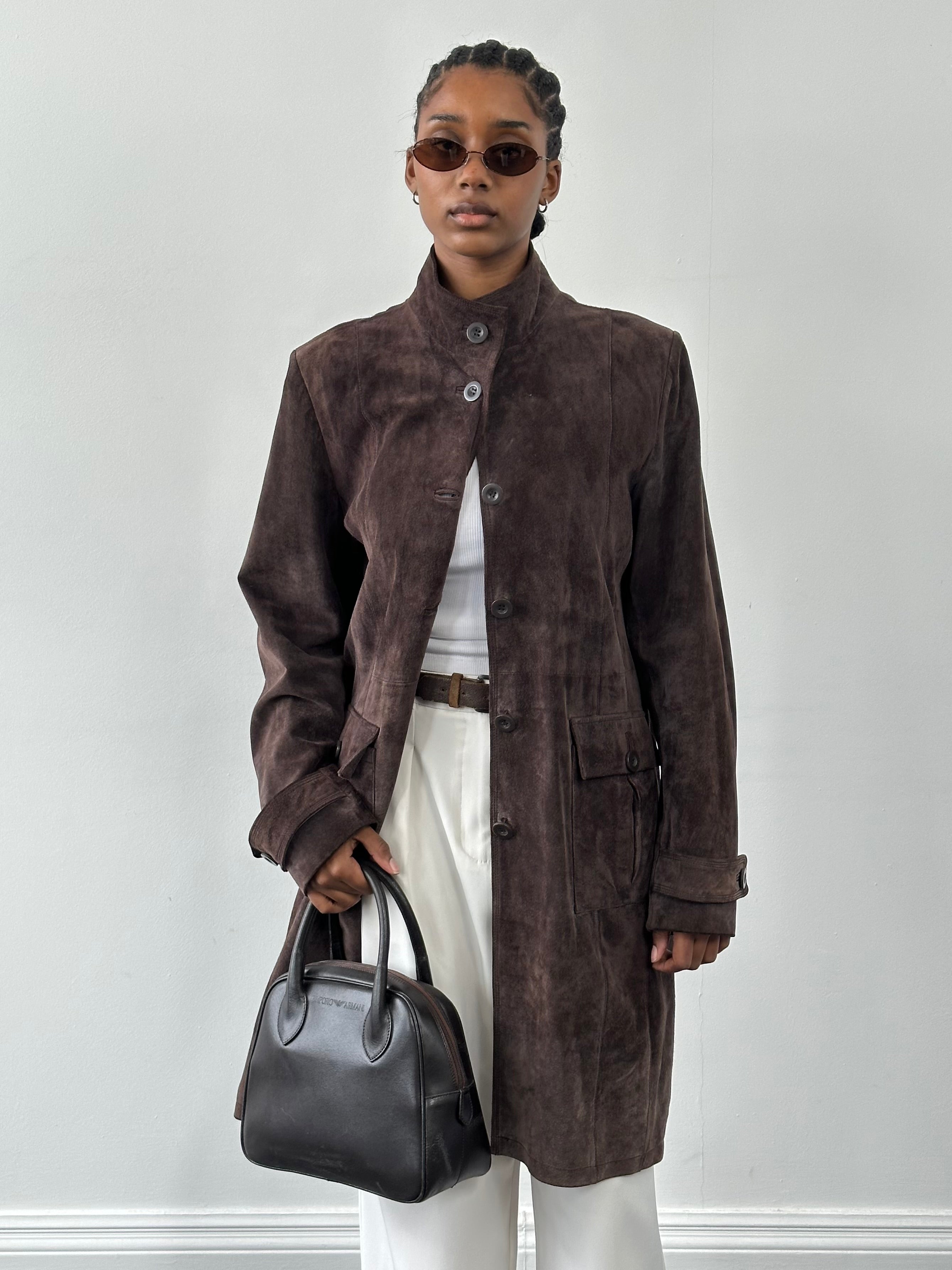 Vintage 1990s suede trench coat in size L, classic leather jacket style with a timeless design and soft suede texture.