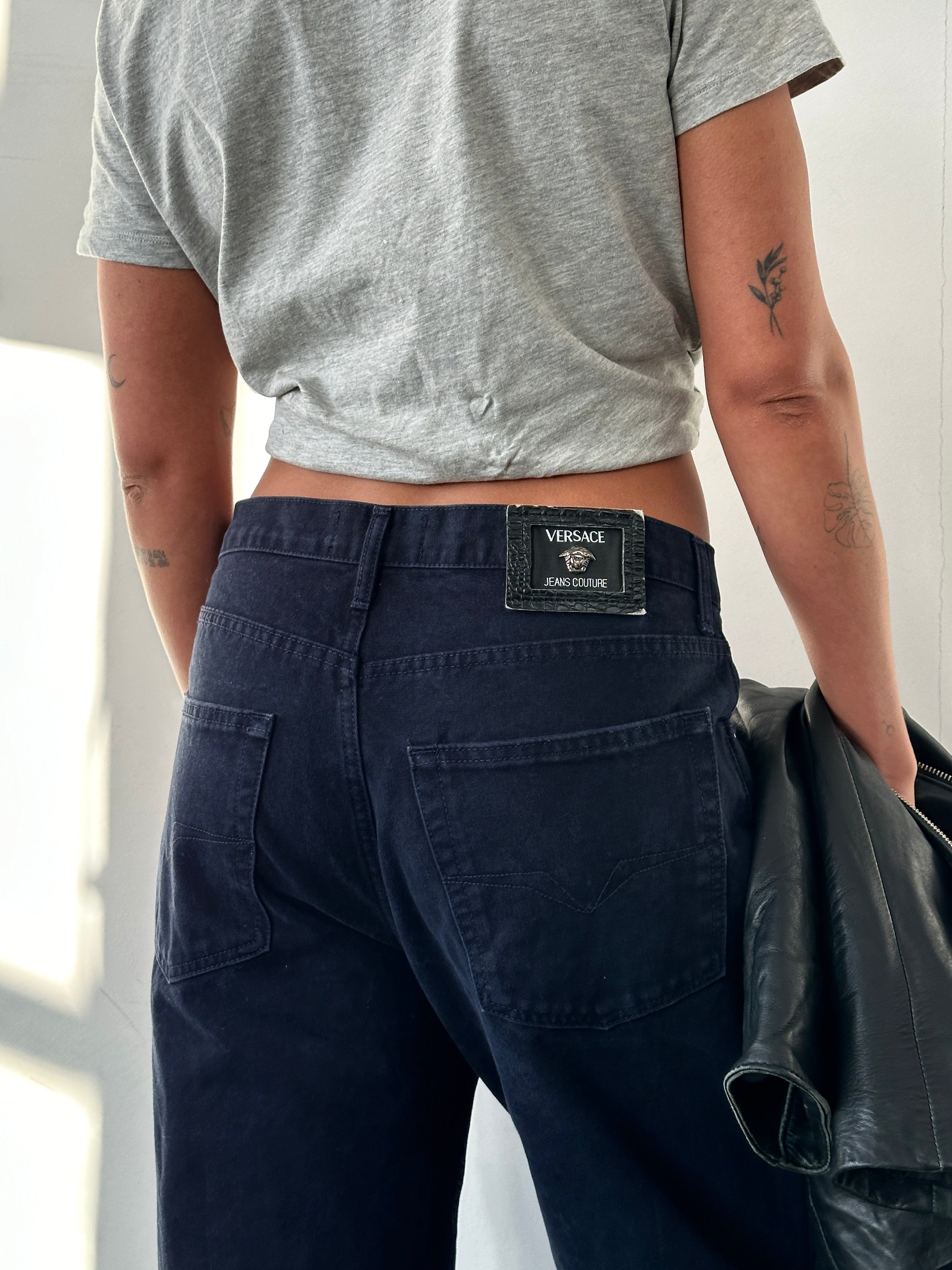 Versace tall pure cotton tapered leg denim jeans in size W34, featuring classic design and durable fabric.