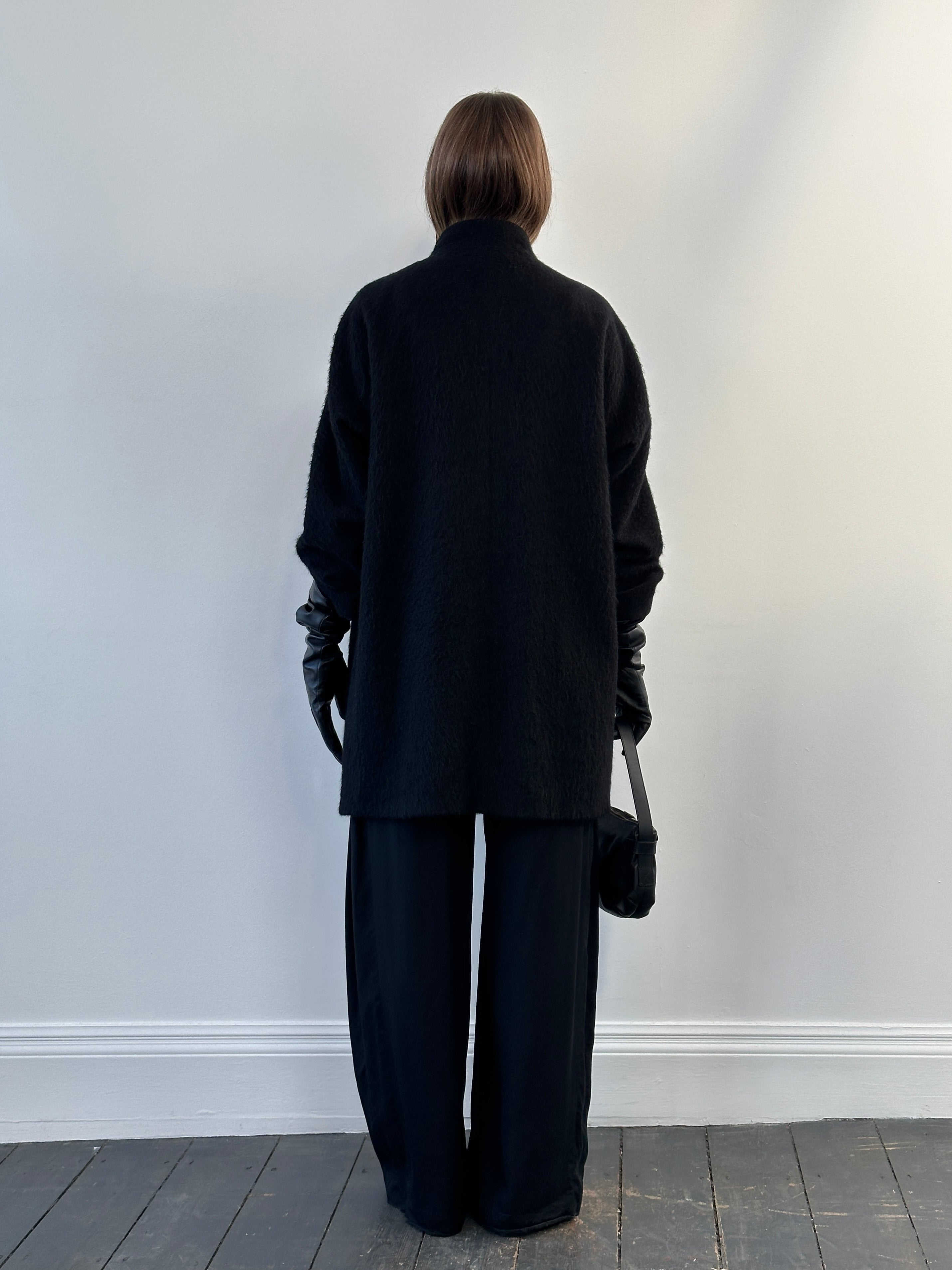 Vintage 1990s wool mohair high neck coat in size M, showcasing the textured fabric and classic design.
