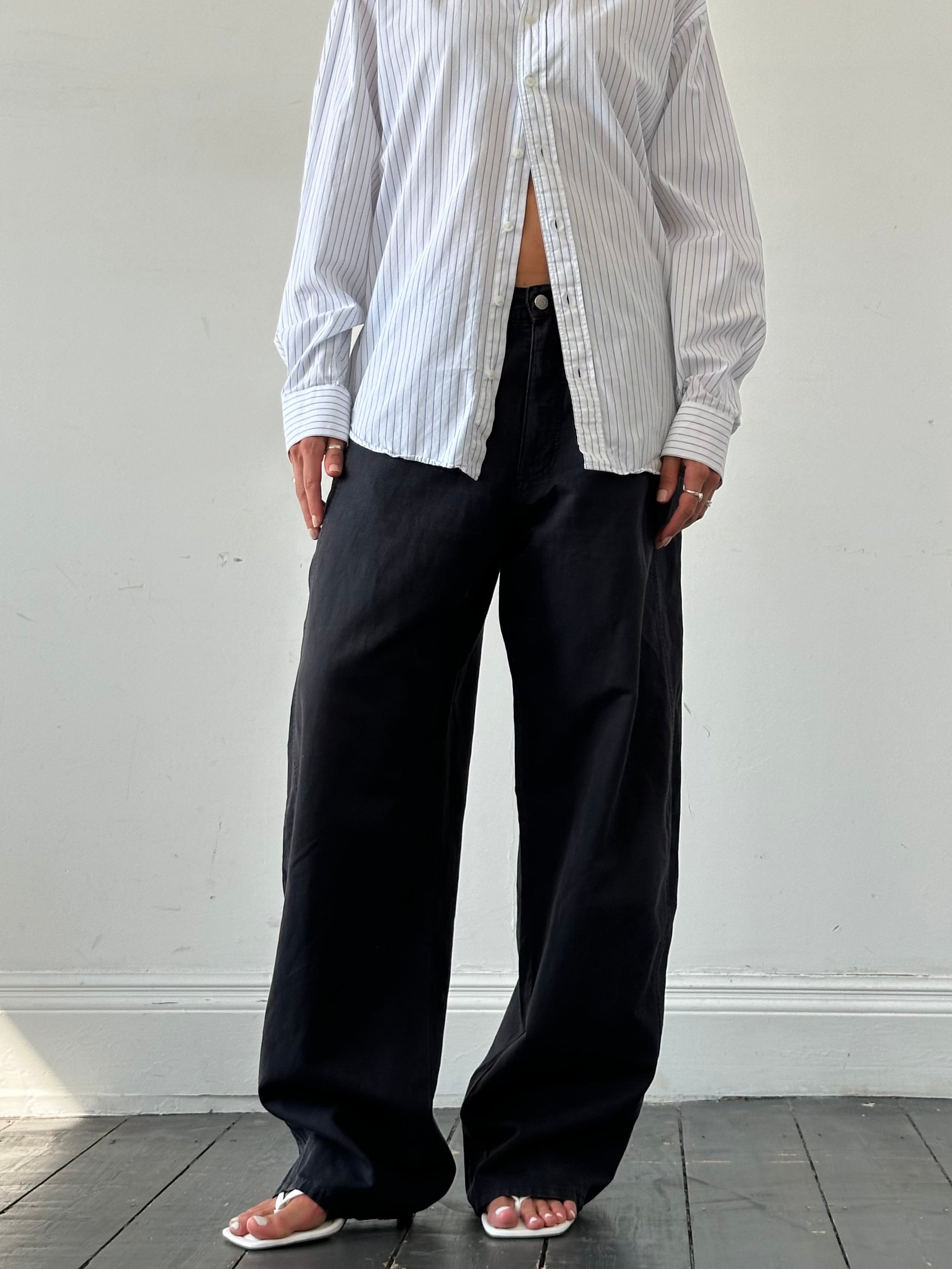Armani Jeans wide-leg cotton trousers in size W32, displayed flat with a focus on the relaxed fit and clean design.