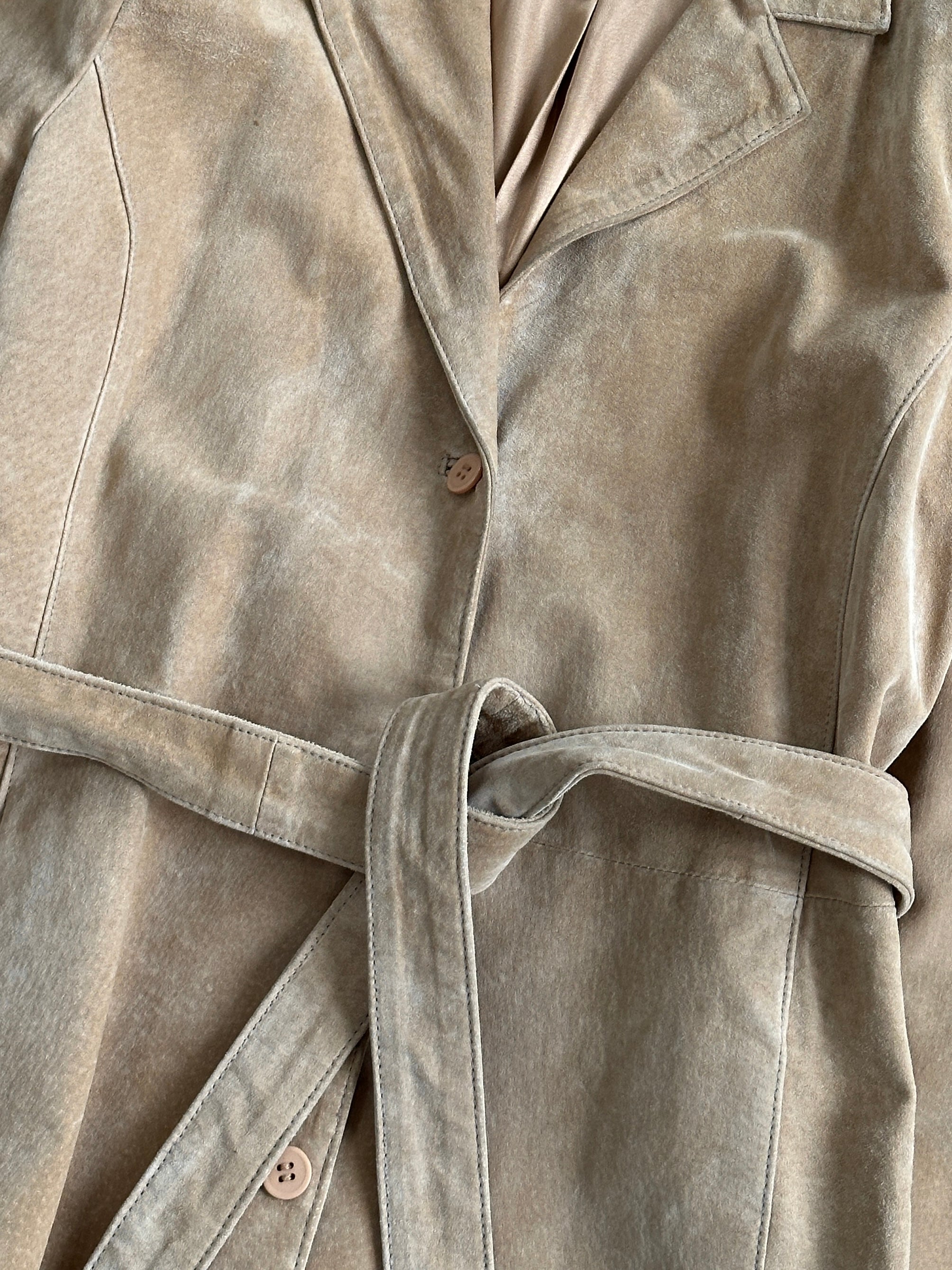 Vintage suede belted jacket in size M/L featuring classic design and stylish details, perfect for casual or retro fashion.