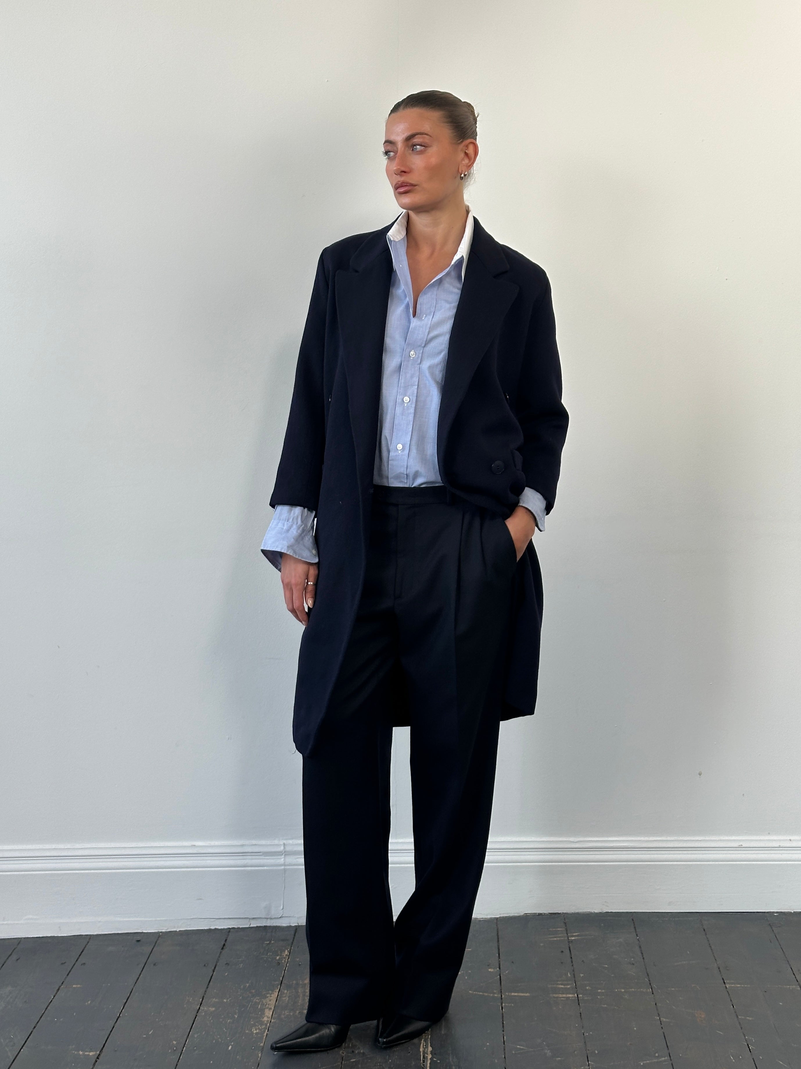 Christian Dior 1980s pure wool double-breasted coat in size S, featuring classic tailored design and elegant lapels.