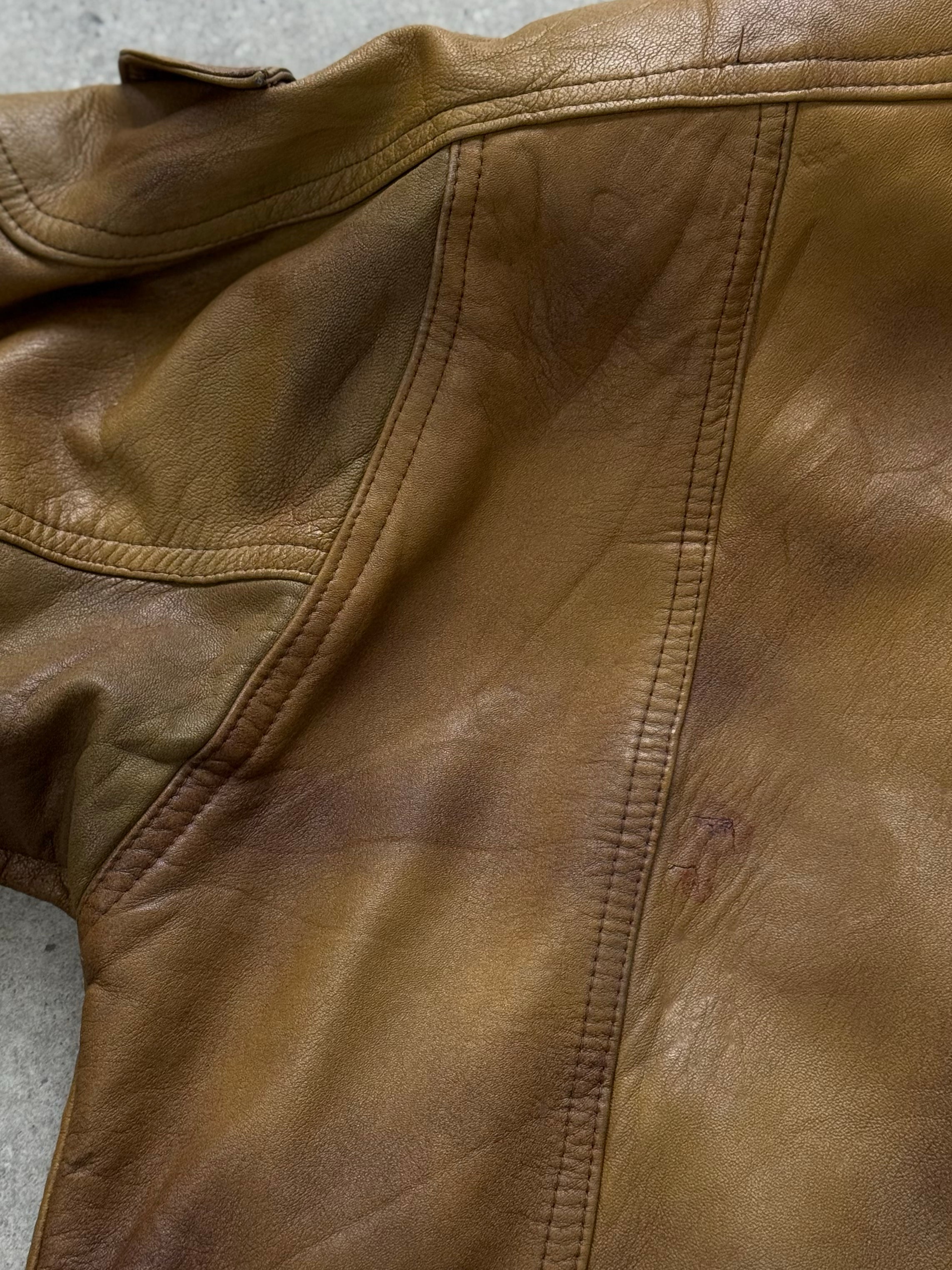 Vintage 1990s leather high neck bomber jacket, size large, featuring a classic design with a front zipper and ribbed cuffs.