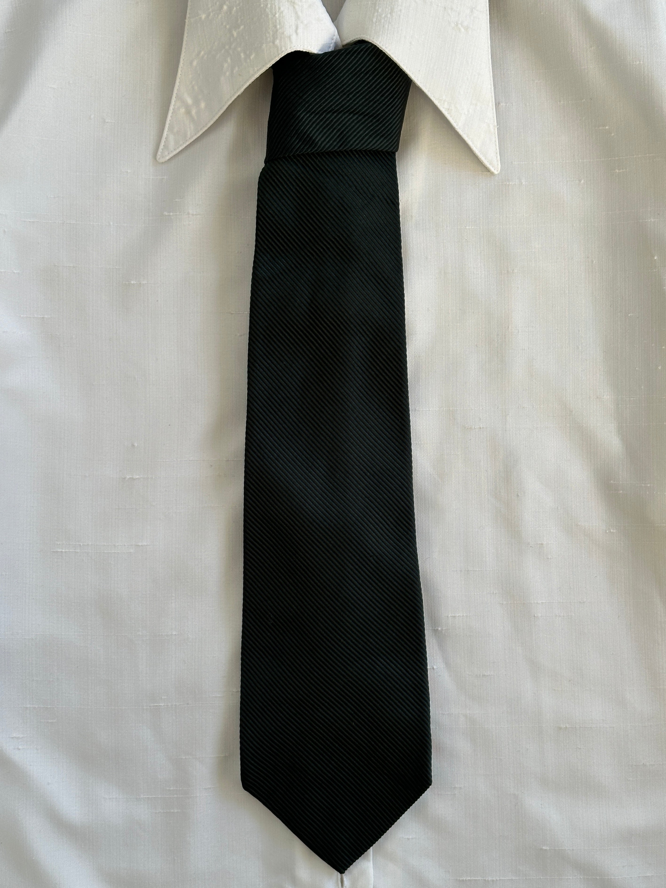 Vintage 1990s silk cotton striped tie with classic pattern, featuring red, navy, and beige colors for a timeless accessory.