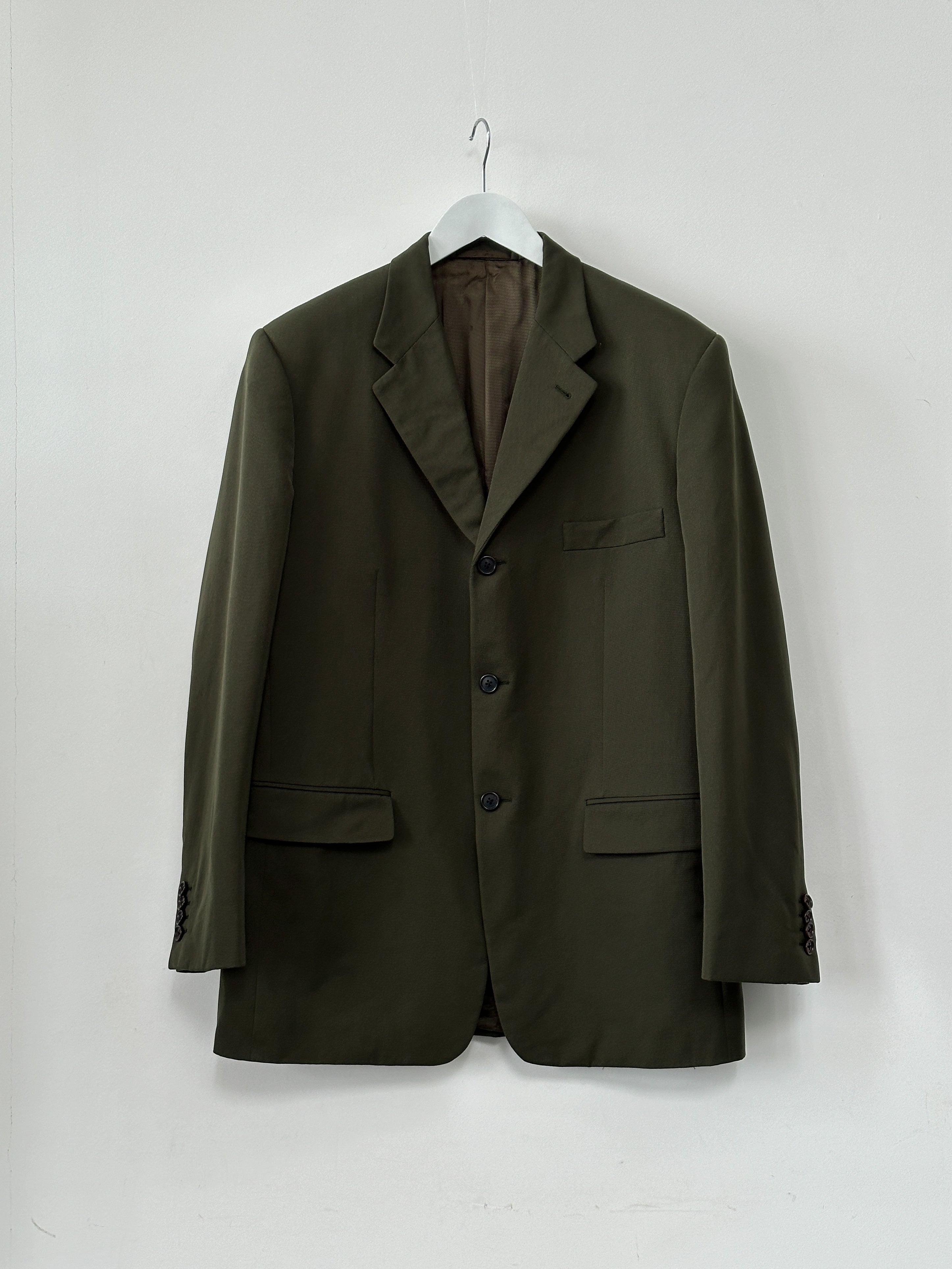 Prada nylon single-breasted blazer in size 44R/XL, sleek navy design with notch lapel and tailored fit.