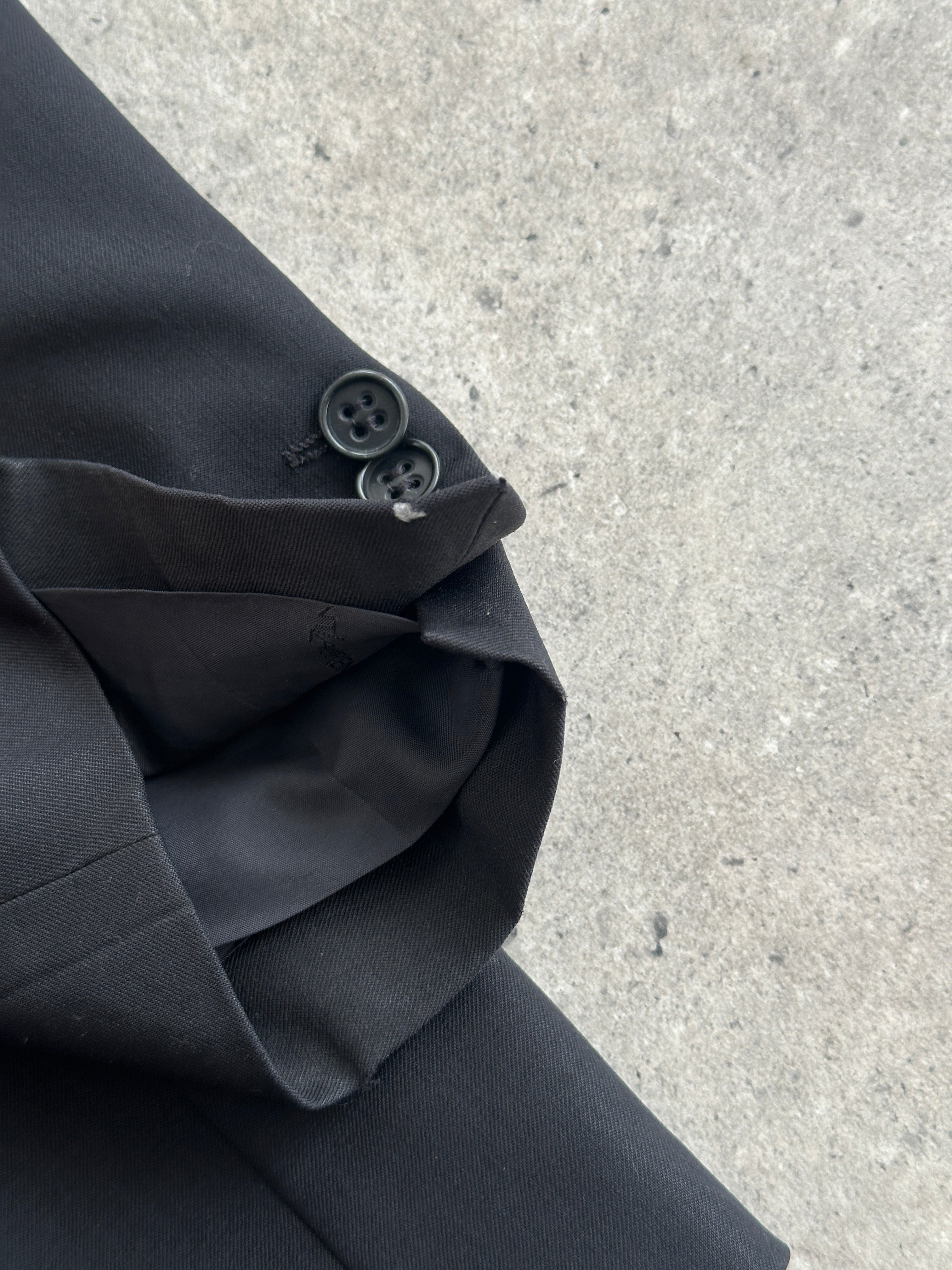 Yves Saint Laurent Pour Homme 1990s pure wool blazer in size 44R/XL, tailored fit with classic lapel and button closure.