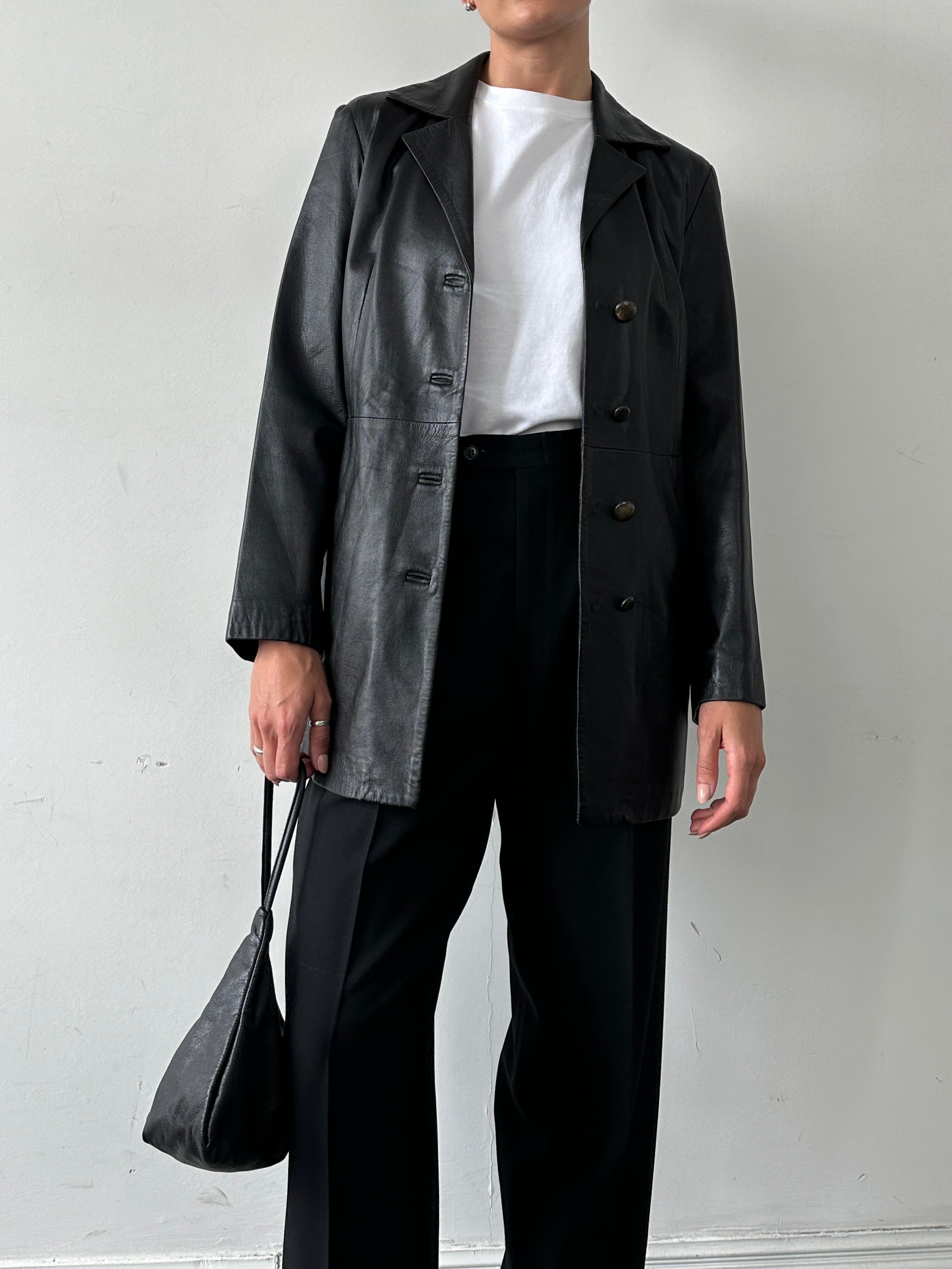Italian vintage longline leather jacket in smooth brown leather, featuring a classic design and tailored fit for men.