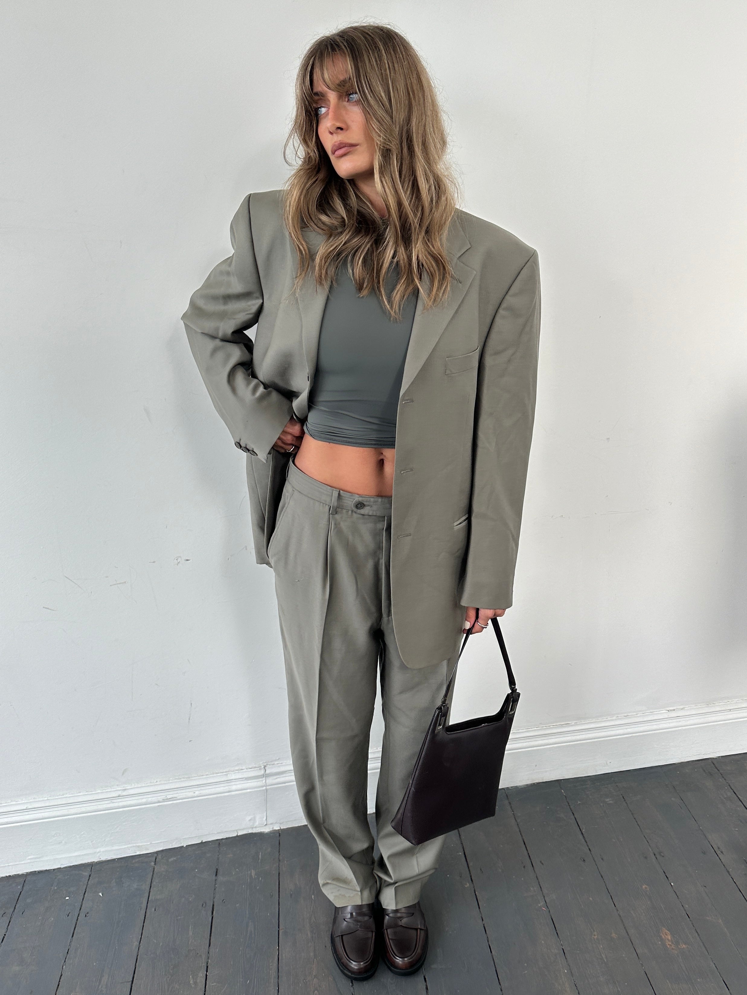 Pierre Cardin pure wool single-breasted suit jumpsuit, size 40R/W33, tailored fit with lapel collar and front buttons.