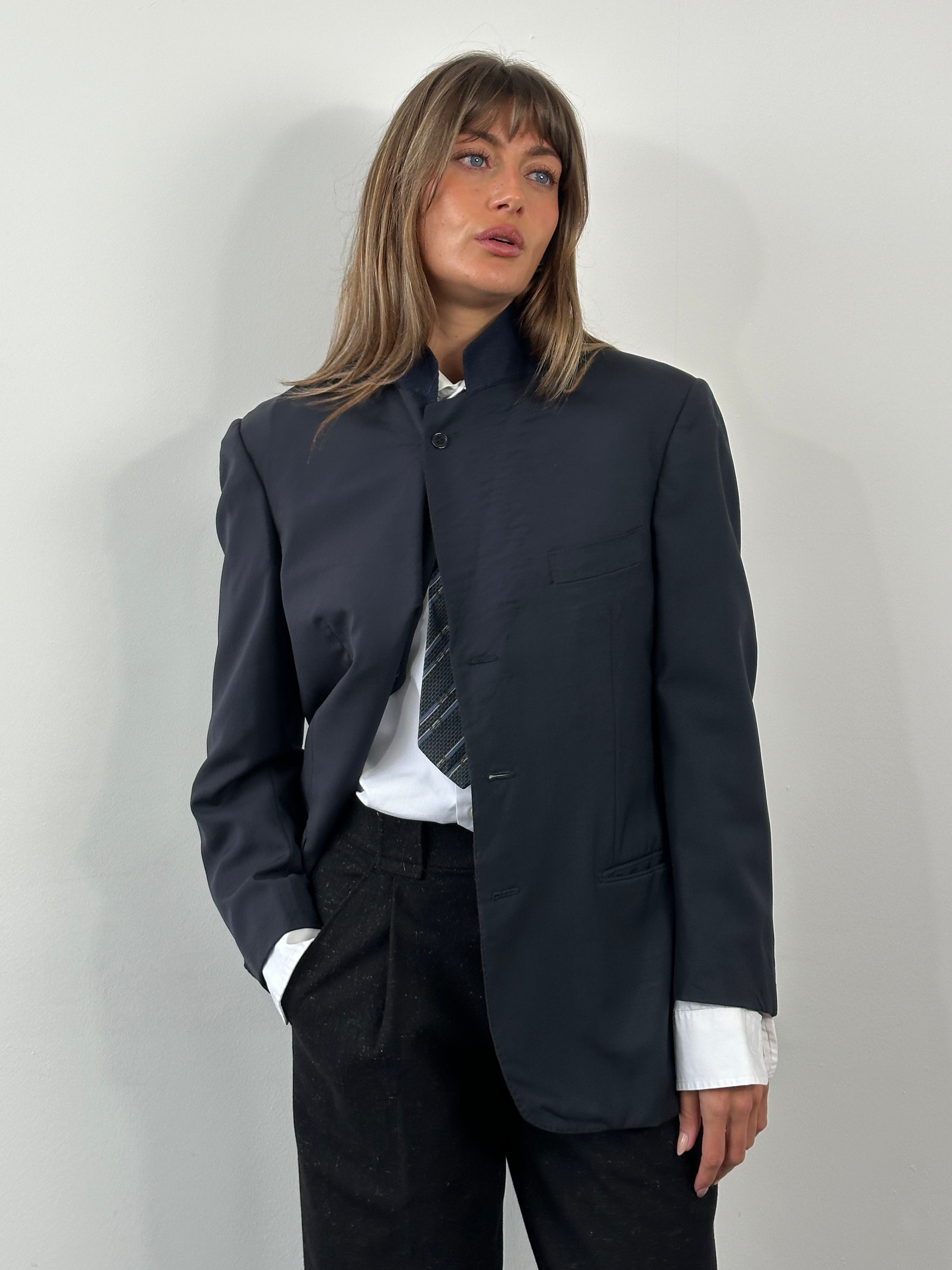 Yves Saint Laurent Pour Homme 1990s pure wool high neck blazer, size 38R/M, in dark color, tailored with a high collar and structured fit.