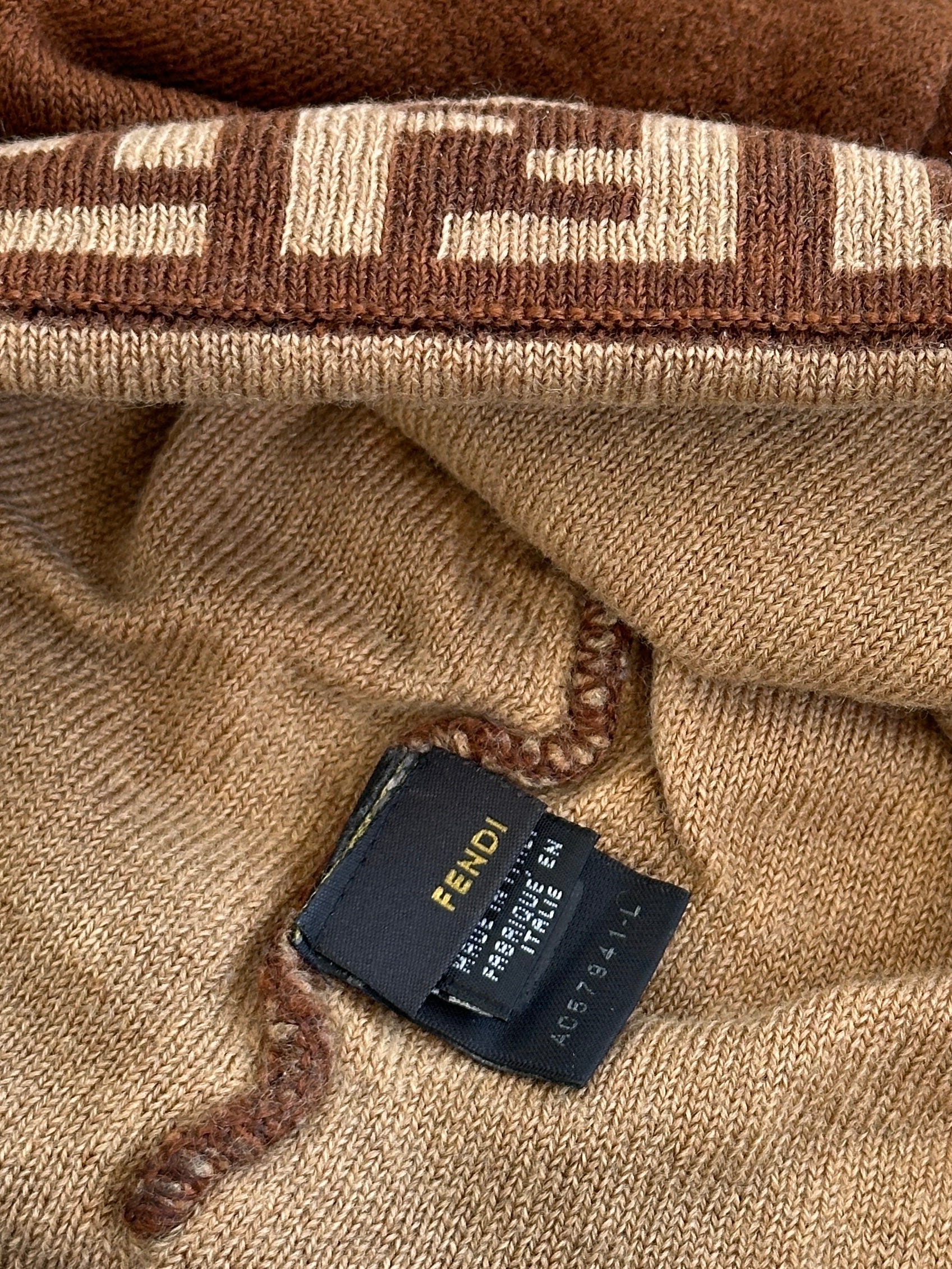 Fendi FF monogram print beanie hat in soft knit fabric, featuring the iconic logo pattern and a snug, stylish fit.