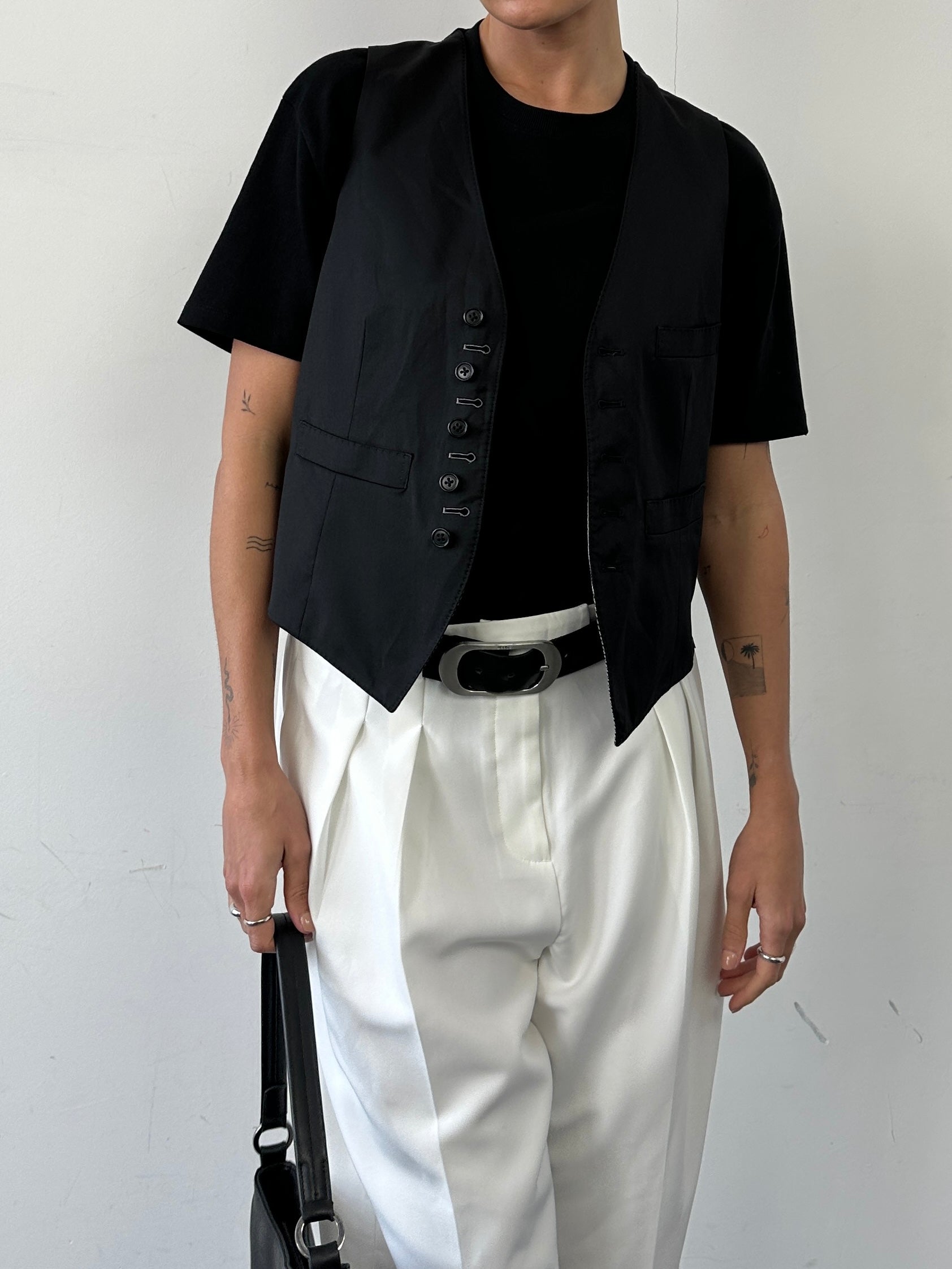 Vintage reversible wool tailored waistcoat in size M, featuring classic design and durable fabric for versatile styling.