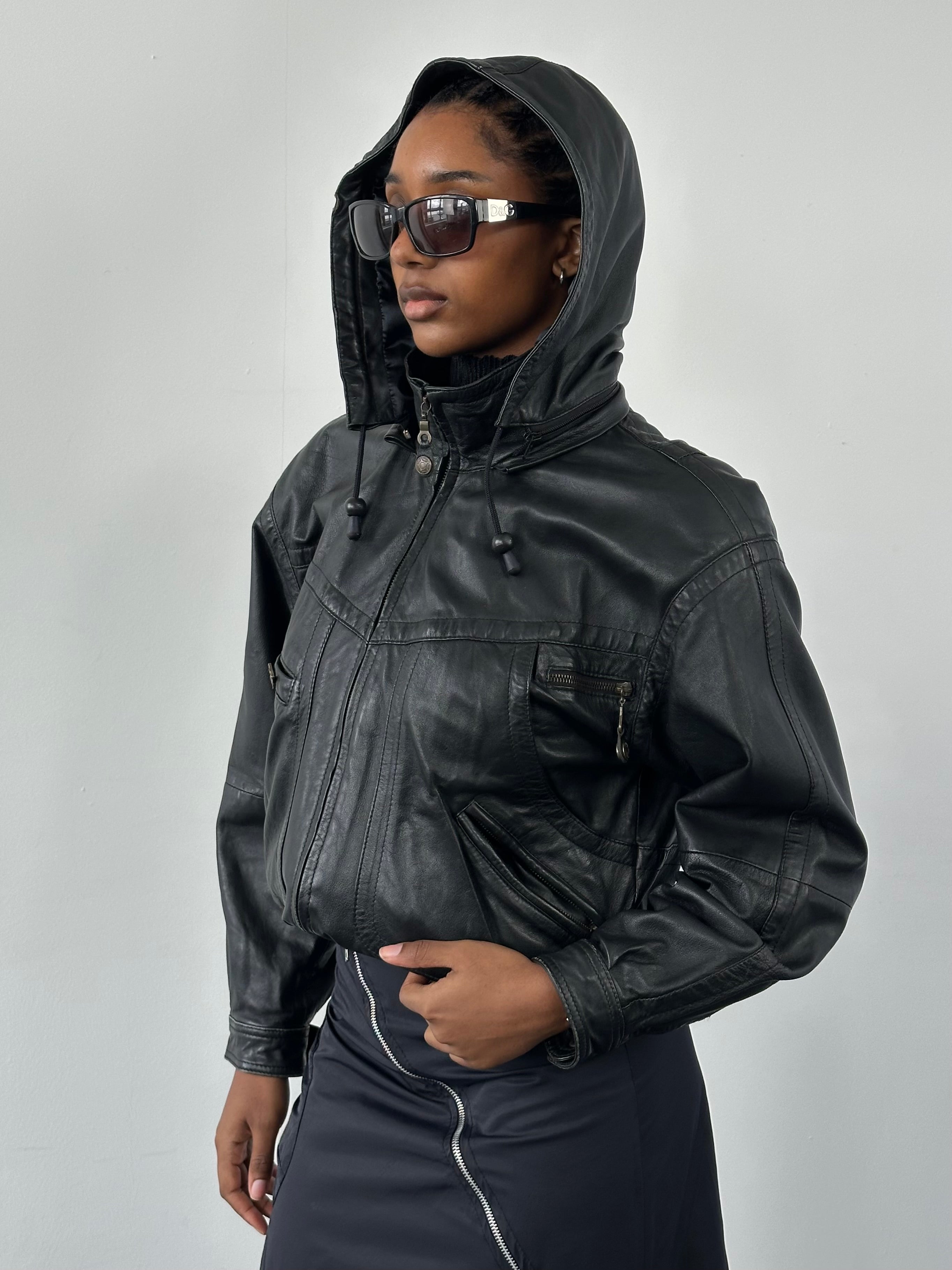 Vintage 1990s leather funnel neck hooded bomber jacket, size small, featuring classic design and textured leather details.