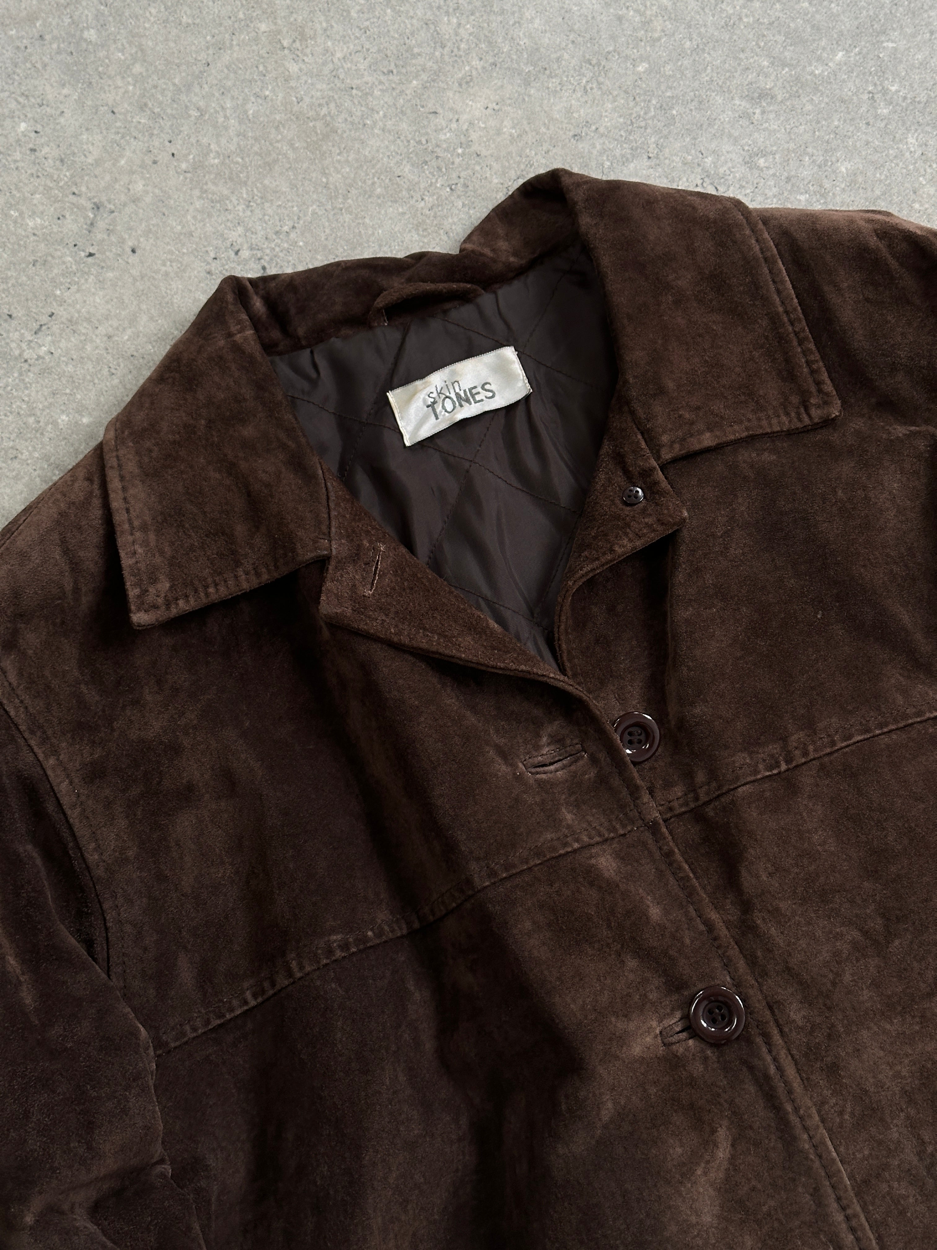Vintage leather jacket made of suede, size large, showcasing classic style and detailed stitching.