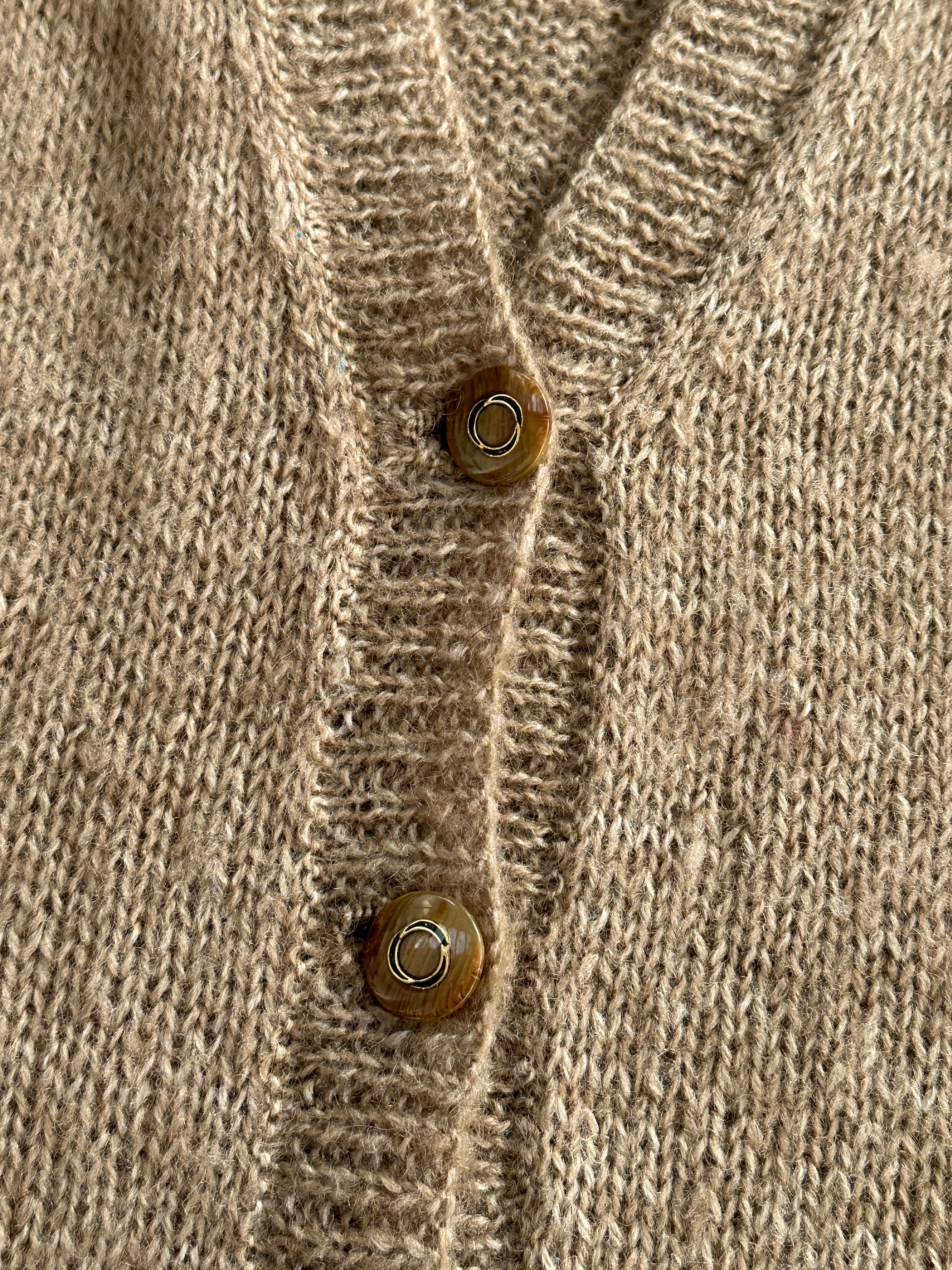 Vintage brand vintage mohair sleeveless cardigan in size L, soft textured knit with a relaxed fit and classic design.