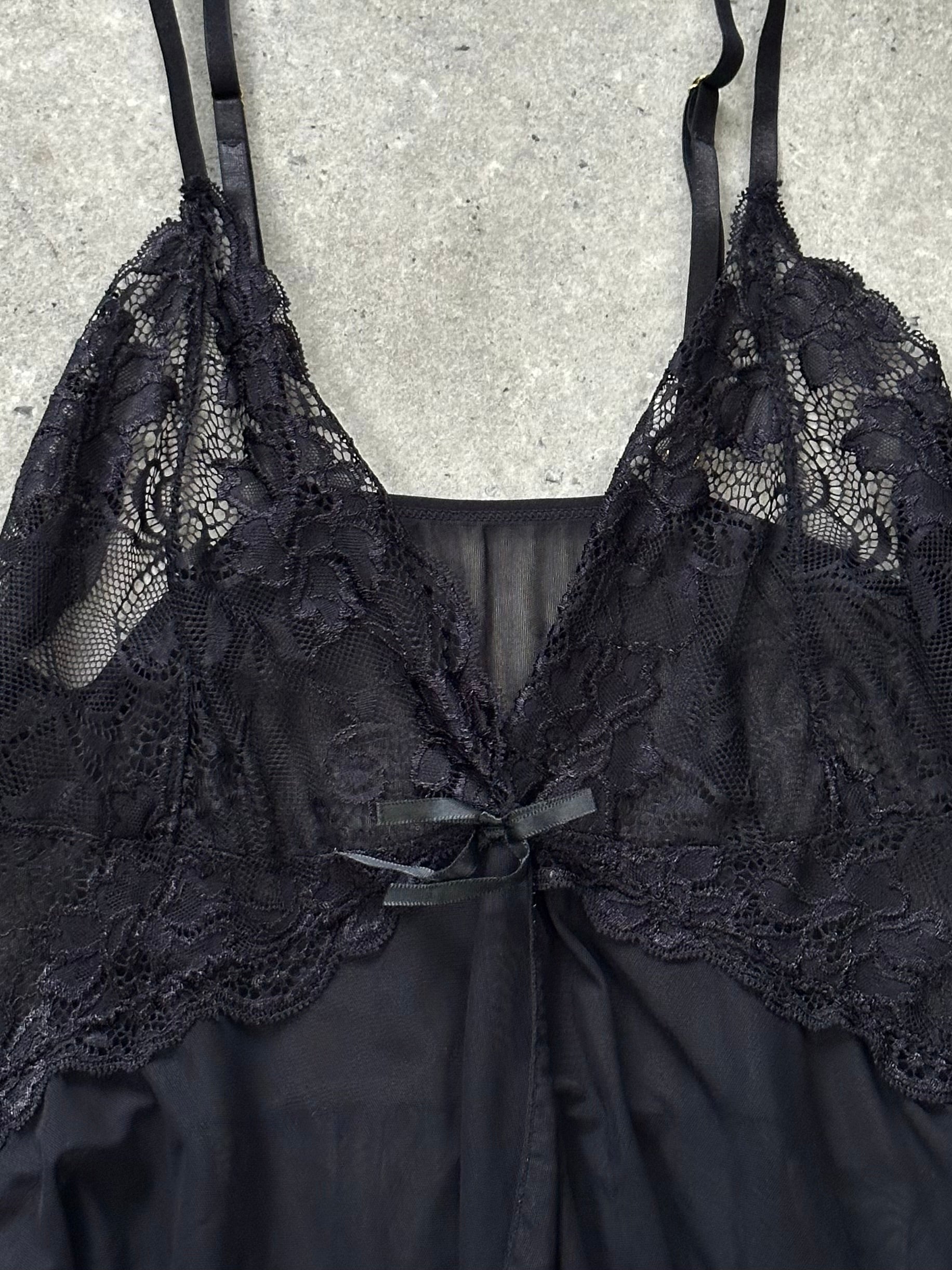 Vintage 1990s sheer lace mesh babydoll top, S/M, featuring delicate floral lace and lightweight, transparent fabric.