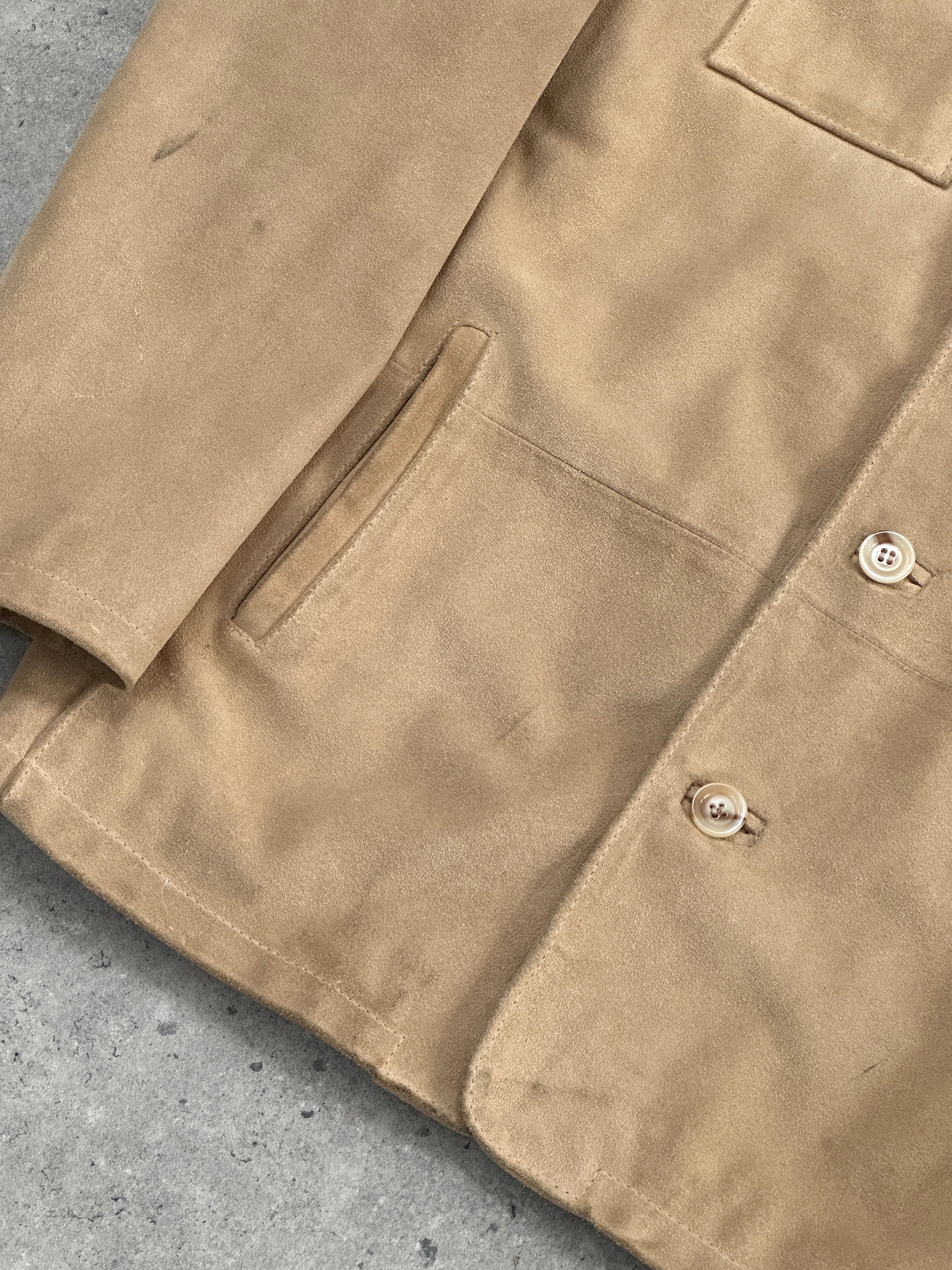 Vintage Italian suede jacket in size L, featuring classic design and soft texture, perfect for a stylish vintage look.