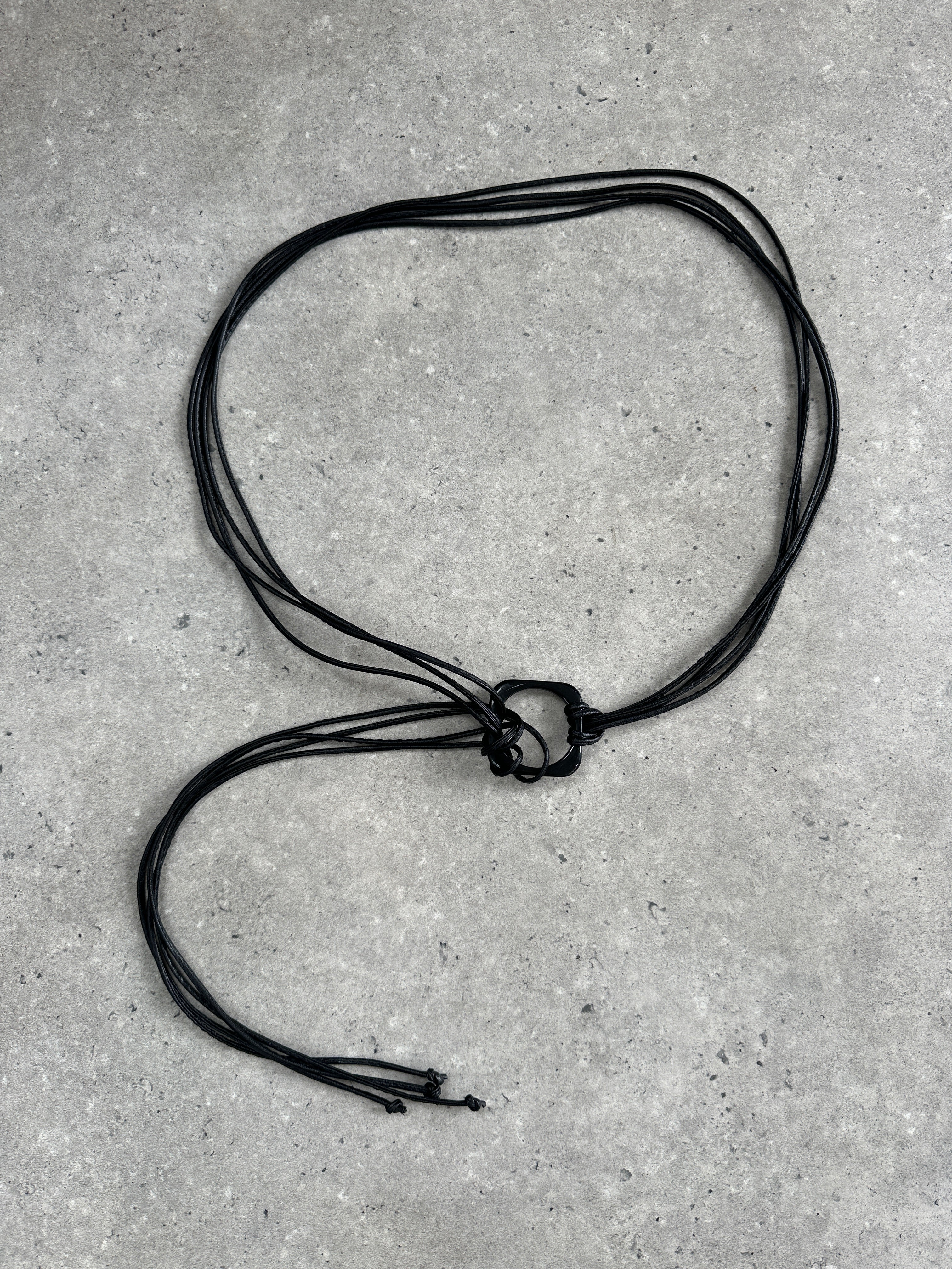 Vintage faux leather rope belt in one size, featuring a rustic design and adjustable fit, perfect for casual or boho outfits.