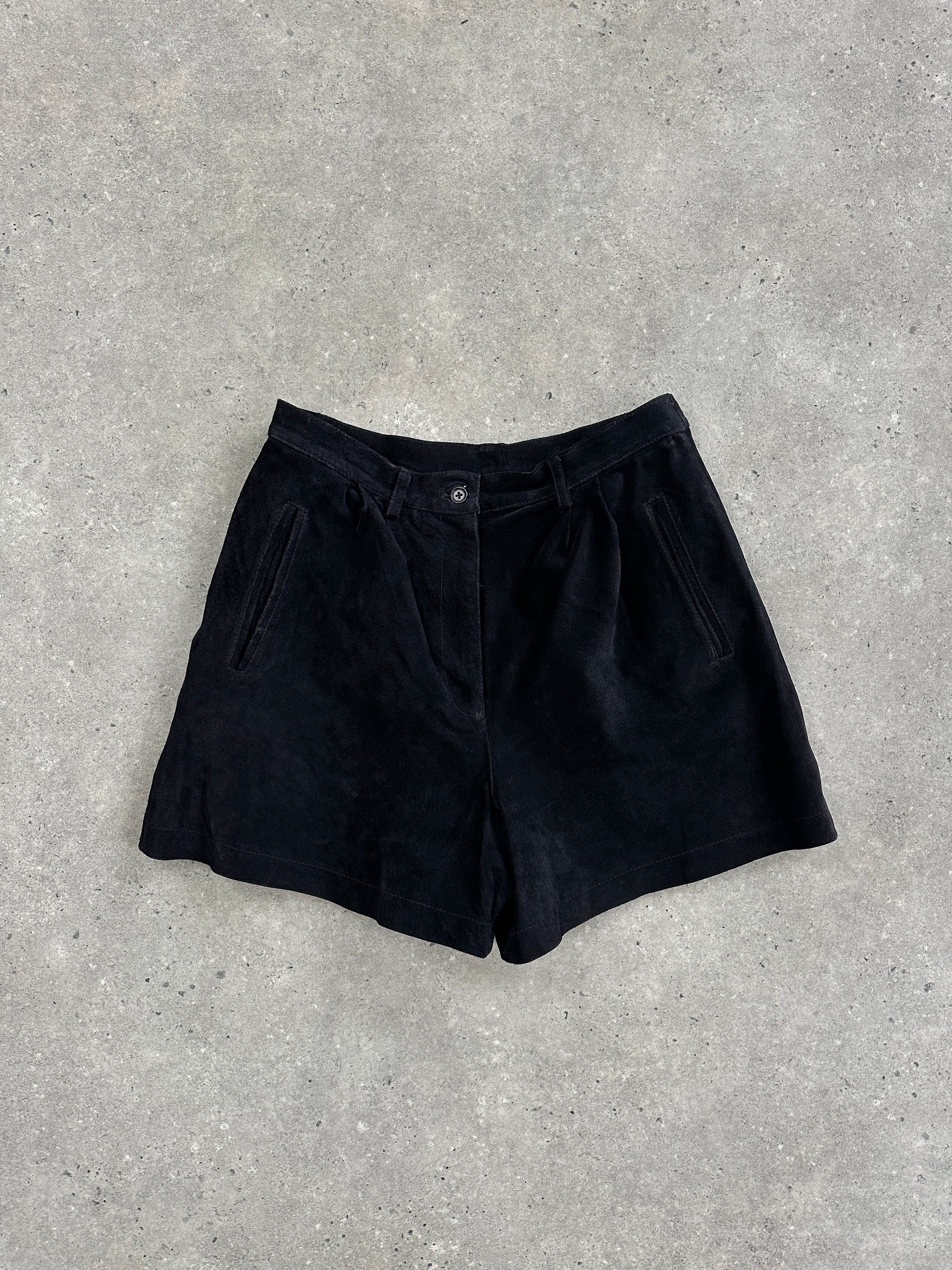 Vintage high waisted suede shorts in W26, featuring a classic fit and soft texture, displayed on a neutral background.