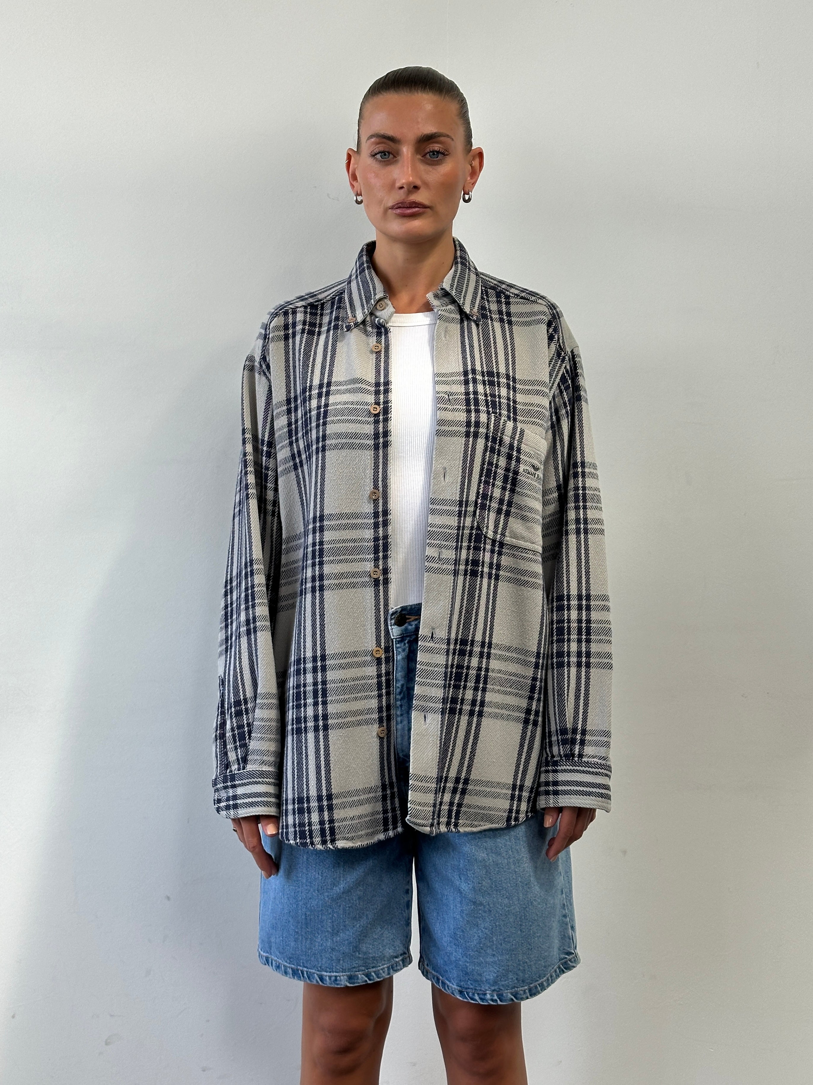 Armani Jeans check flannel cotton shirt in size L/XL, featuring a classic plaid pattern and logo detail.