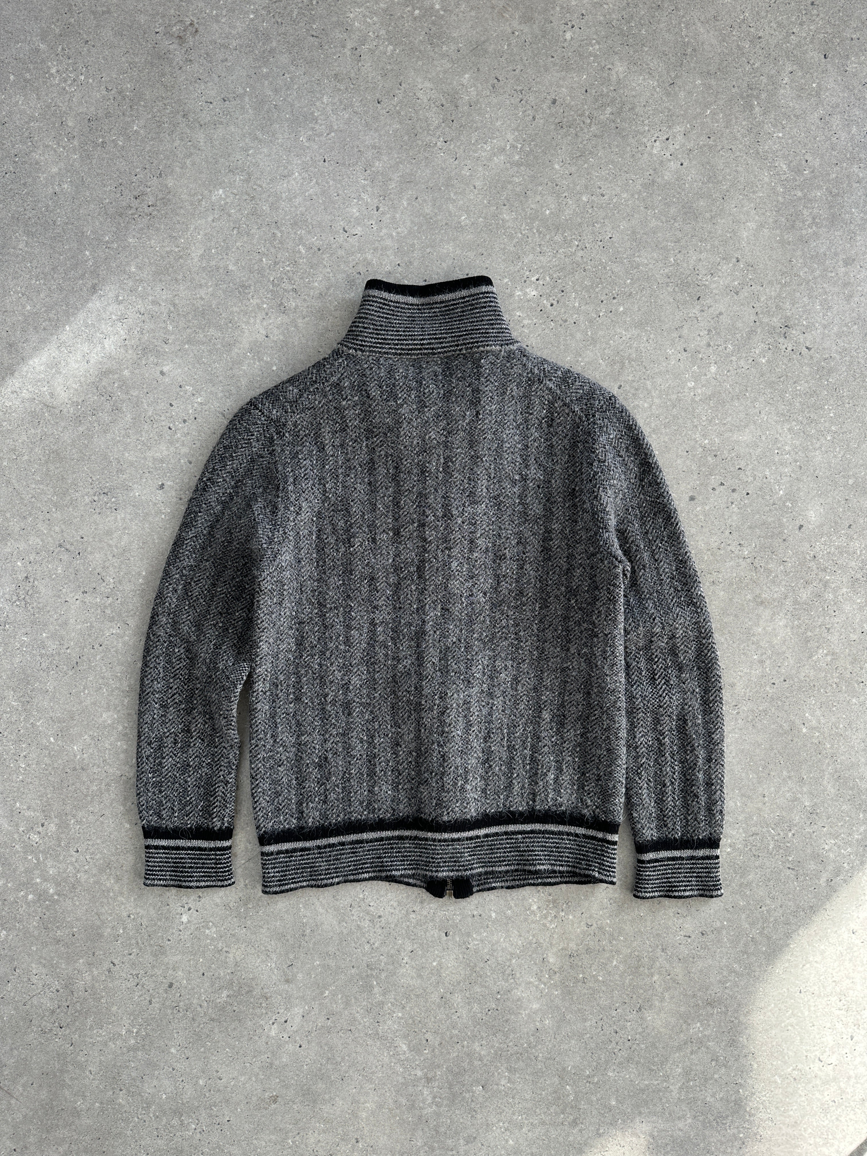 Gucci wool mohair logo patch cardigan in size small, featuring a knit design with a prominent Gucci logo patch on the front.