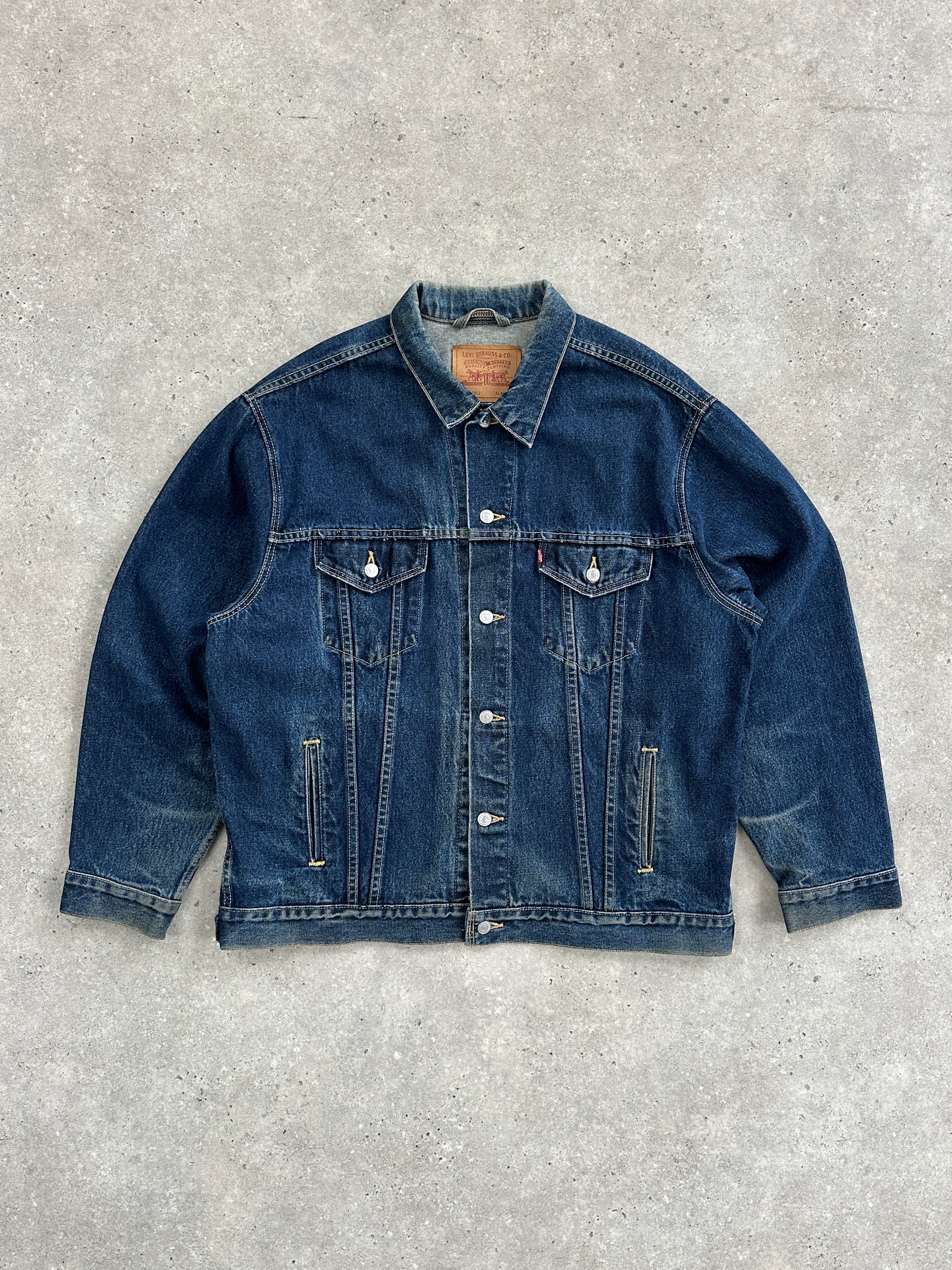 Levi’s denim jacket in XXL size, classic blue color, featuring button front and chest pockets, displayed on a hanger.