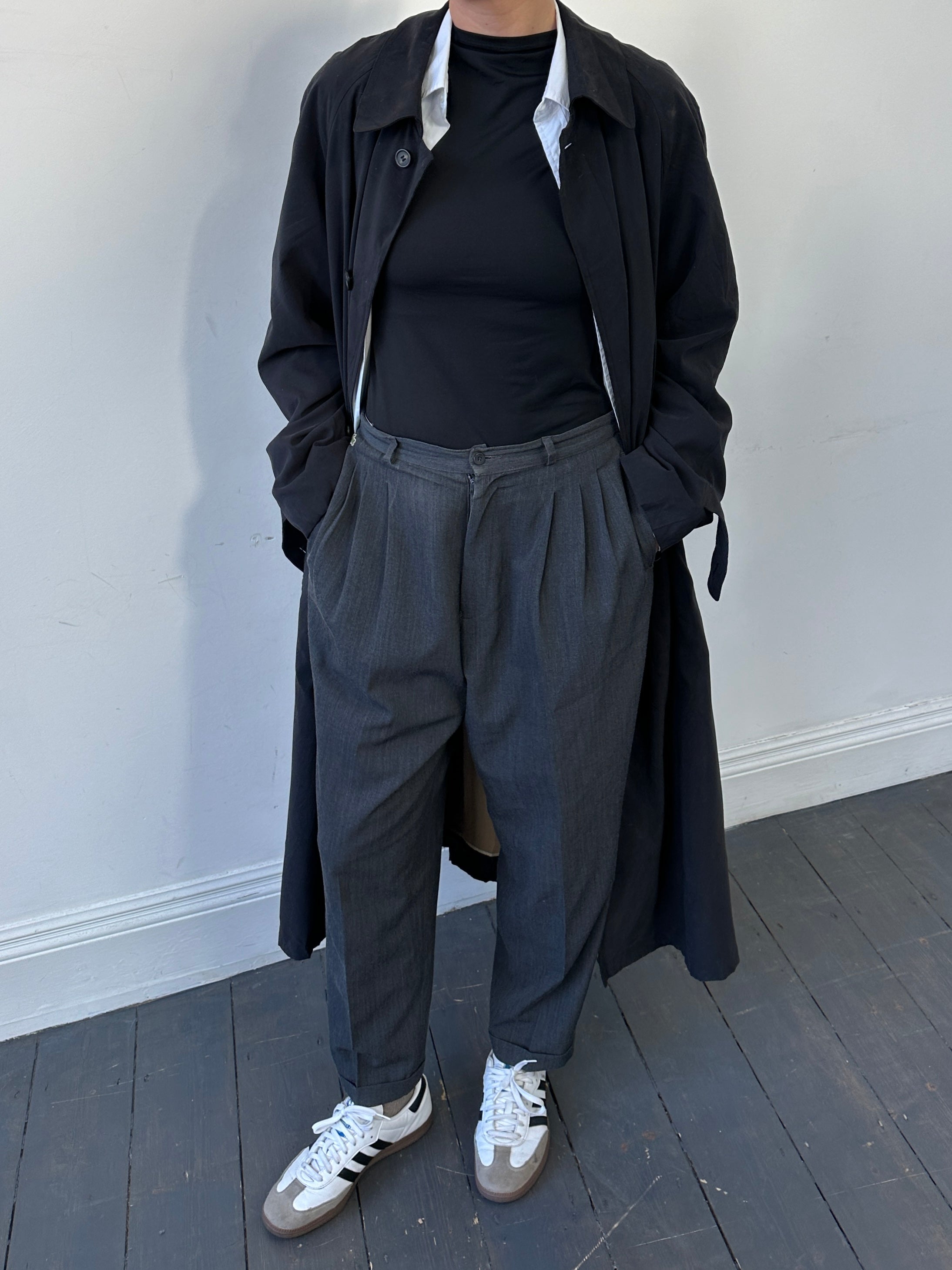 Lacoste wool pleated balloon leg trousers in size W30, featuring a classic logo and tailored fit, displayed on a neutral background.