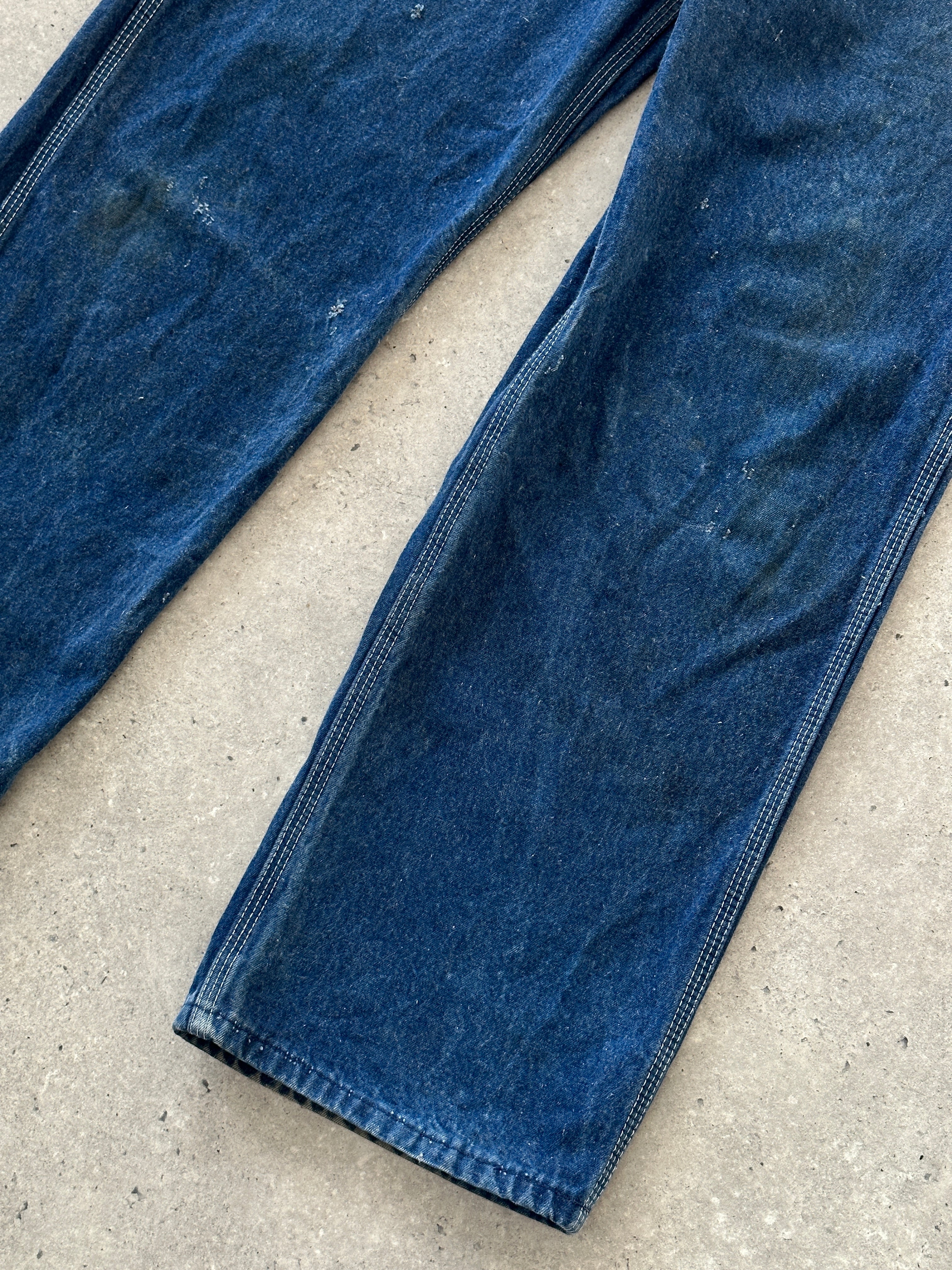 Dickies Pure Cotton Denim Dungarees in XS/S laid flat showing classic blue denim fabric and adjustable shoulder straps.