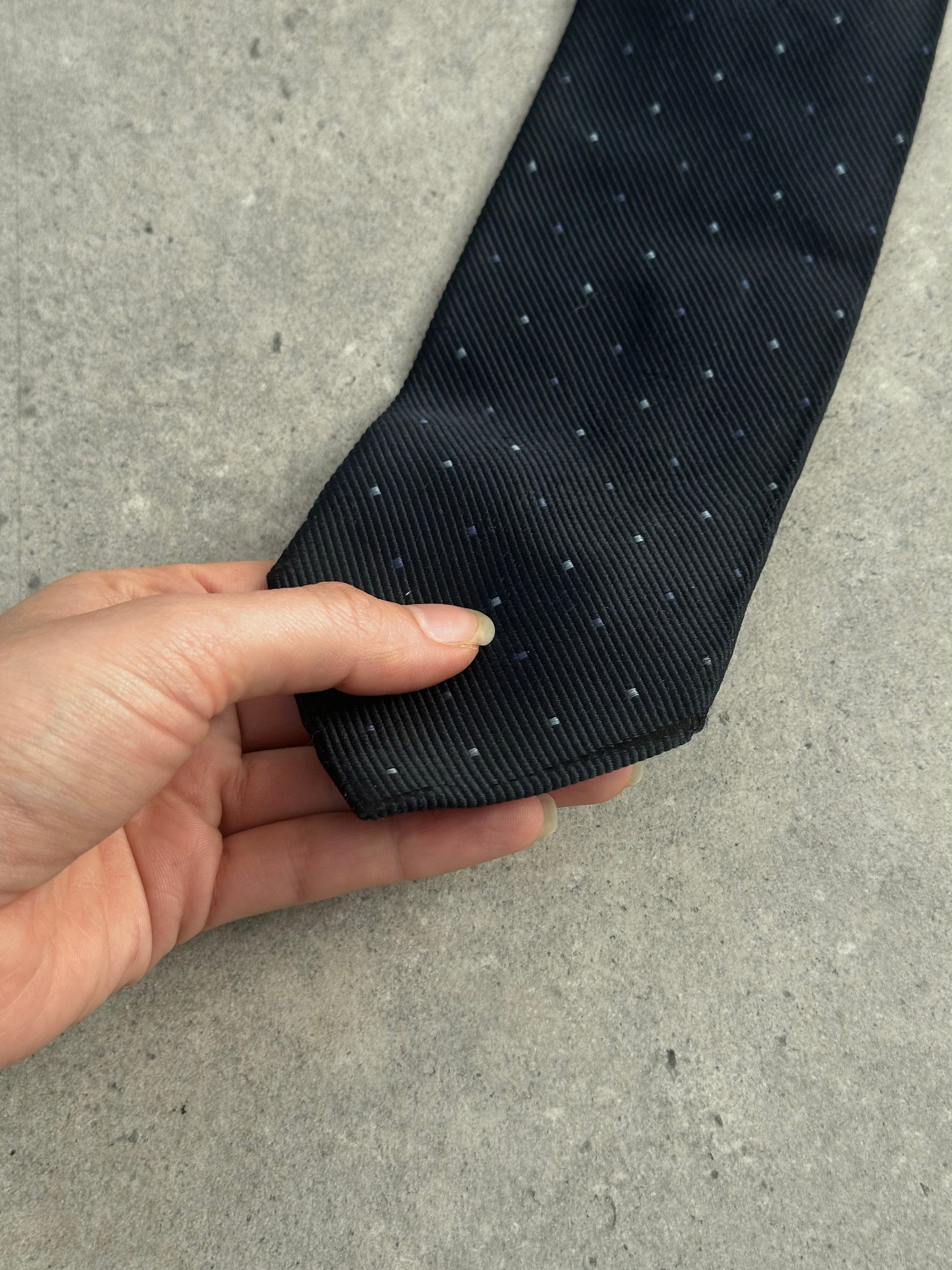 DKNY 2000s pure silk woven print tie with intricate pattern, featuring rich colors and detailed craftsmanship.