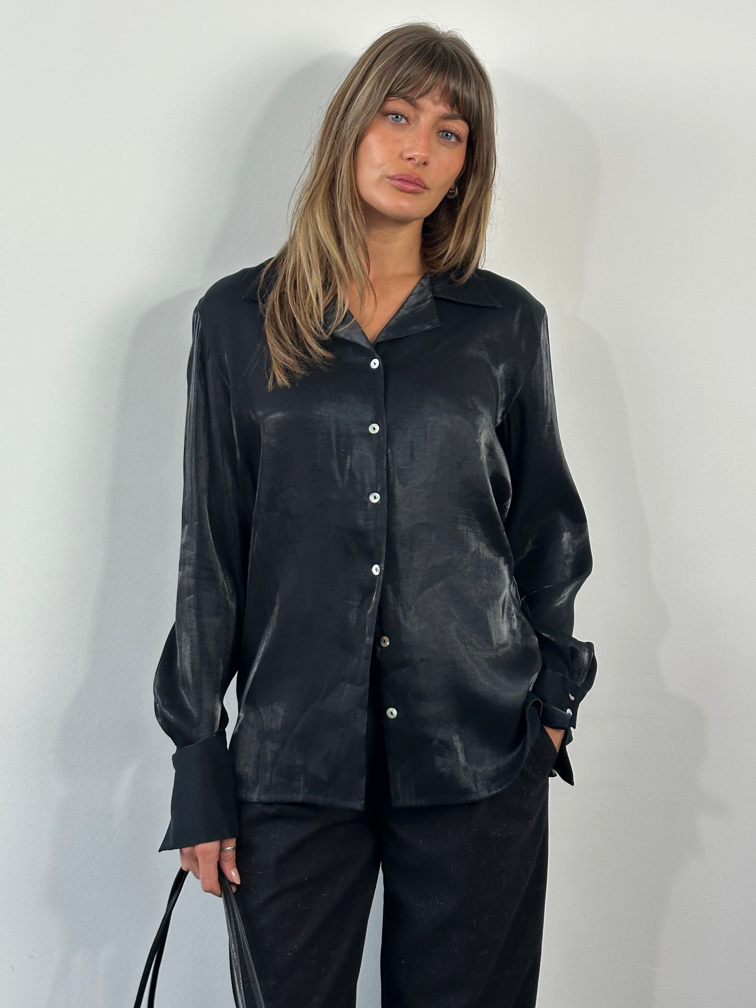 Vintage 1990s men's dress shirt, medium size, featuring classic button-down style and vintage fabric details.