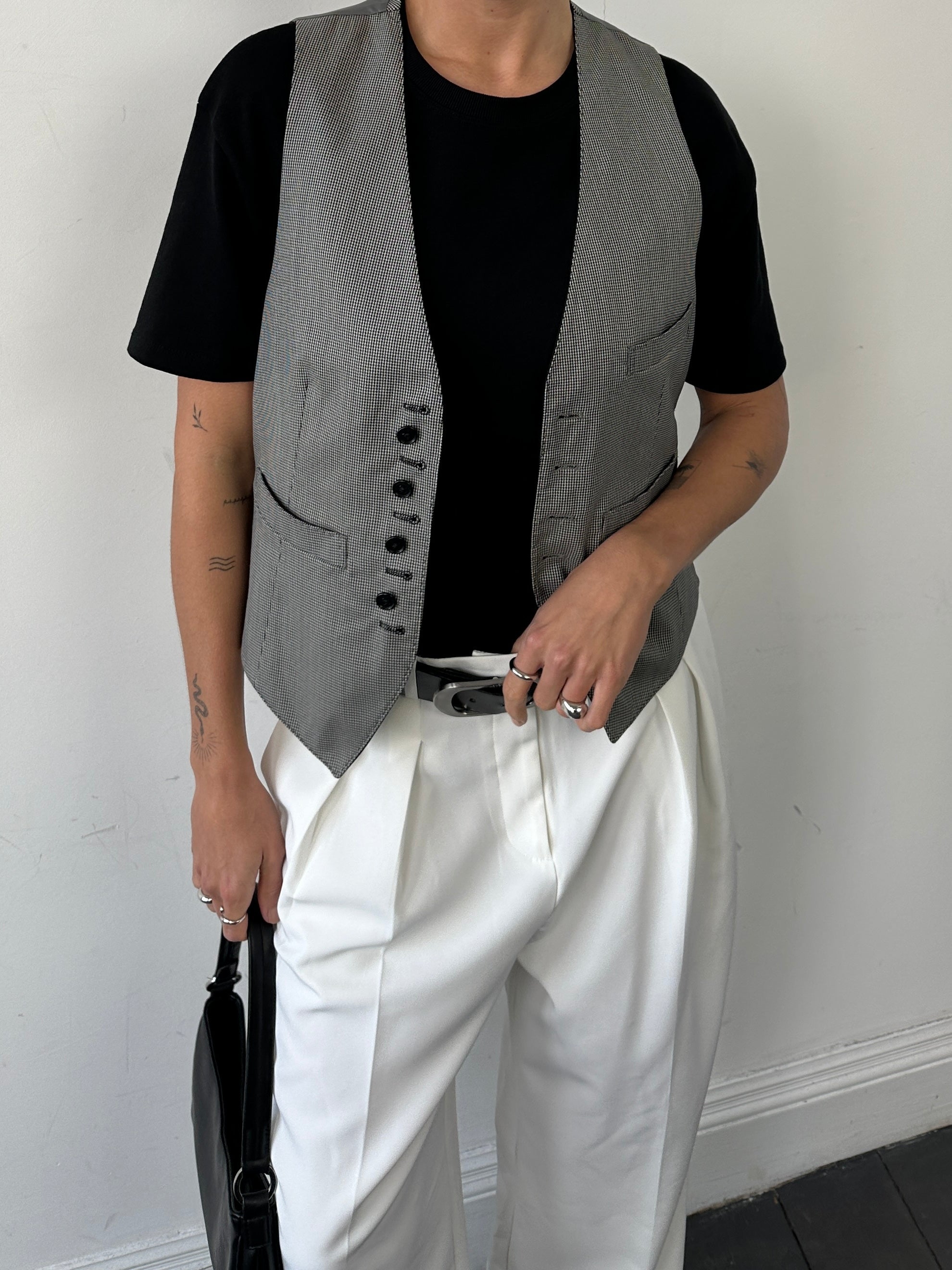 Vintage reversible wool tailored waistcoat in size M, featuring classic design and versatile styling options.