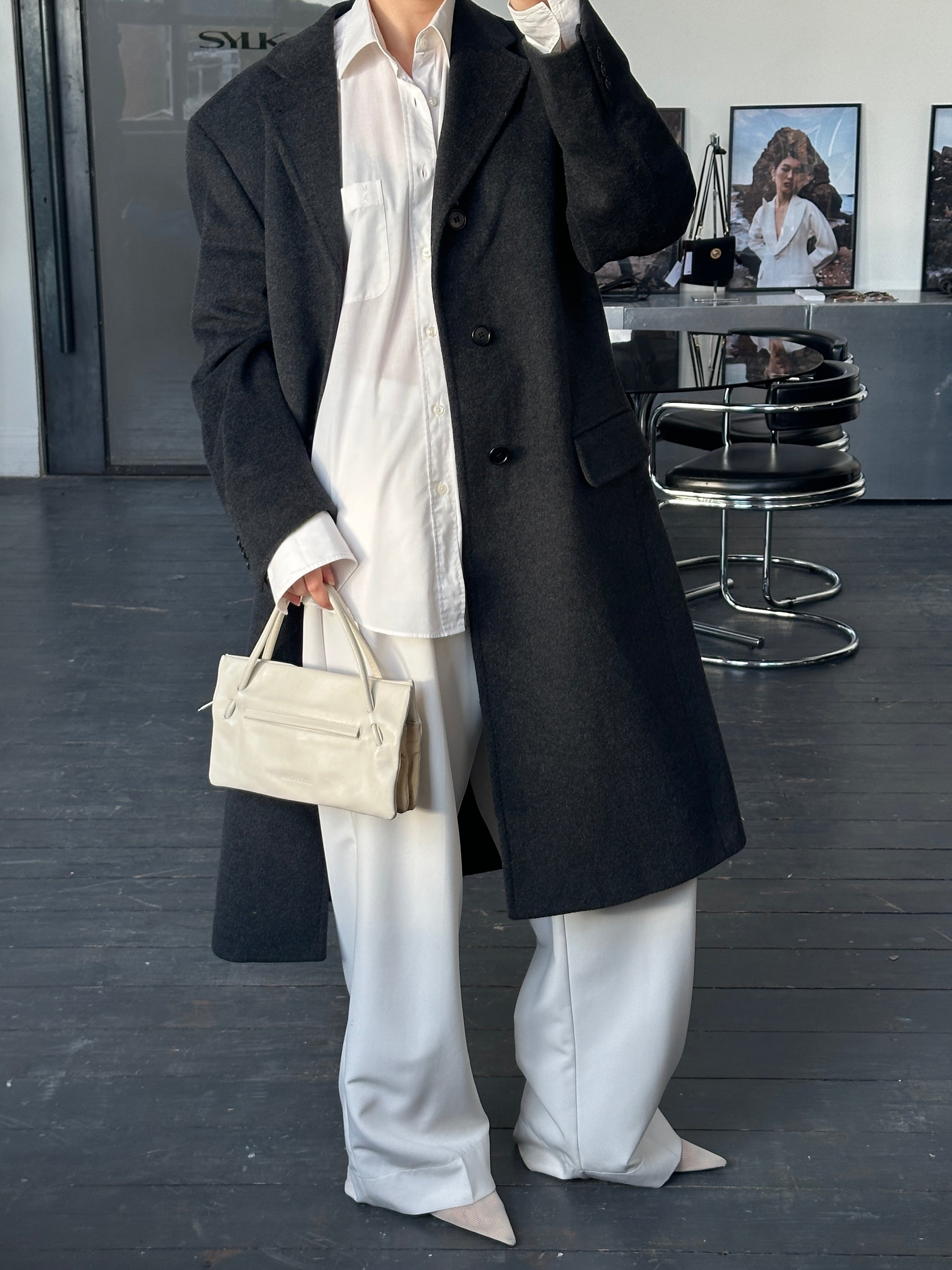 Vintage Italian 1990s wool and cashmere coat in XL, stylish, warm, with classic design and textured fabric.