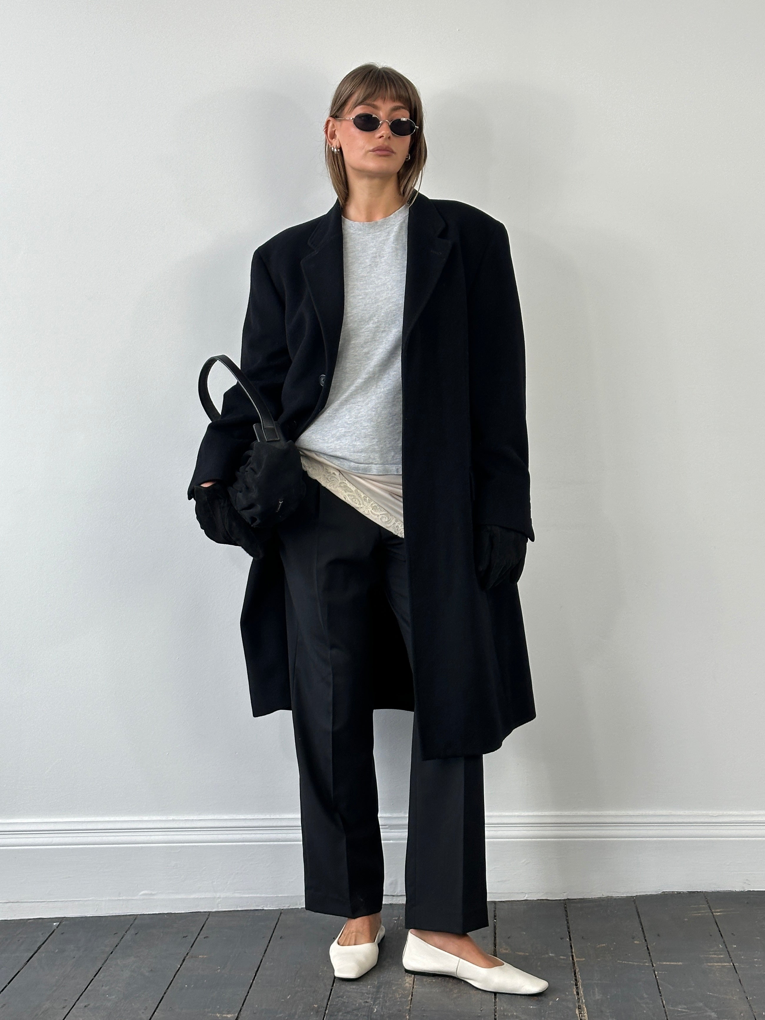 Balmain 1990s wool coat with concealed placket, minimal design, in XL size, shown on a hanger with neutral background.
