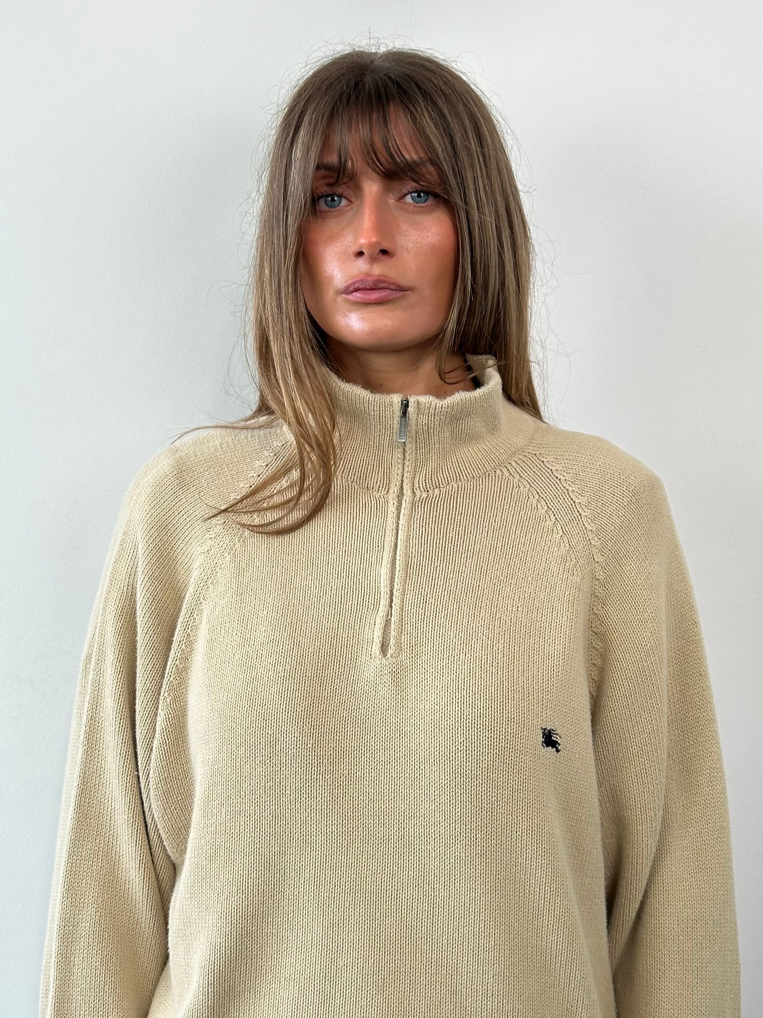 Burberry London pure cotton quarter zip jumper in XL, featuring the iconic logo and classic design, displayed on a neutral background.